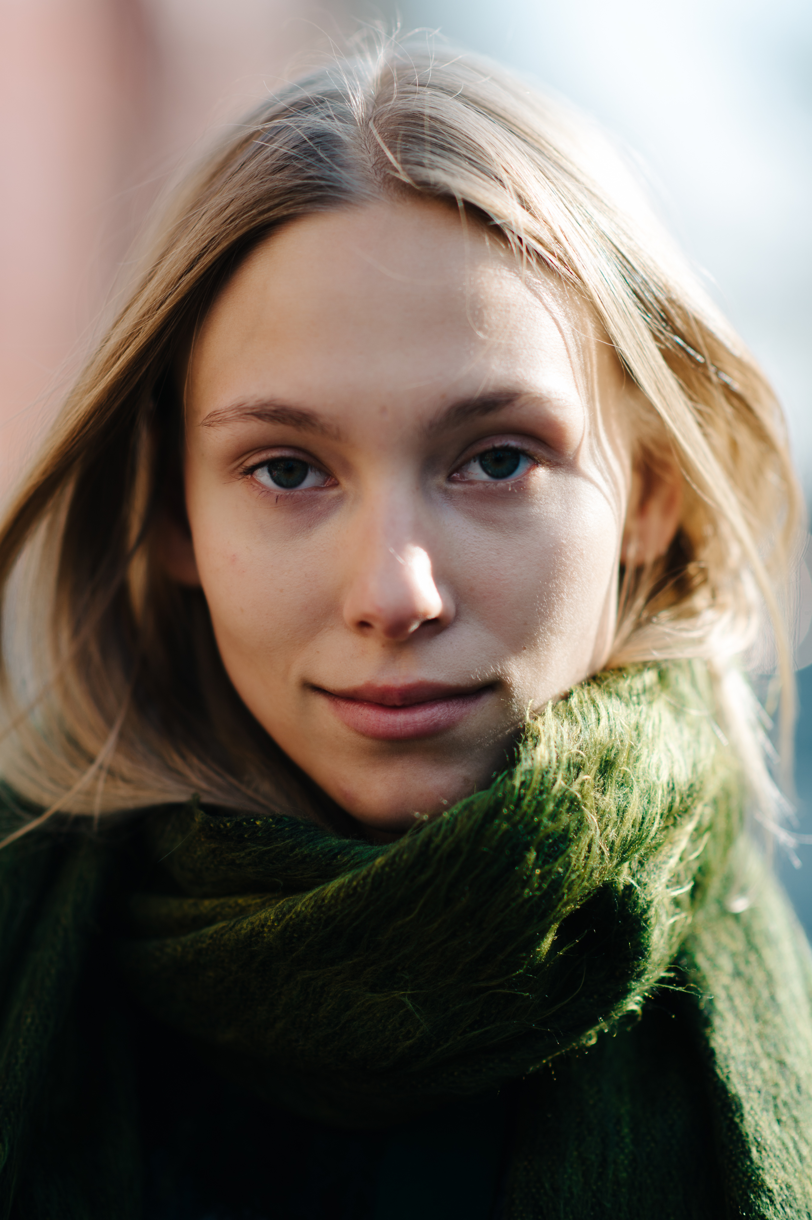 Portrait of a model wearing green scarf