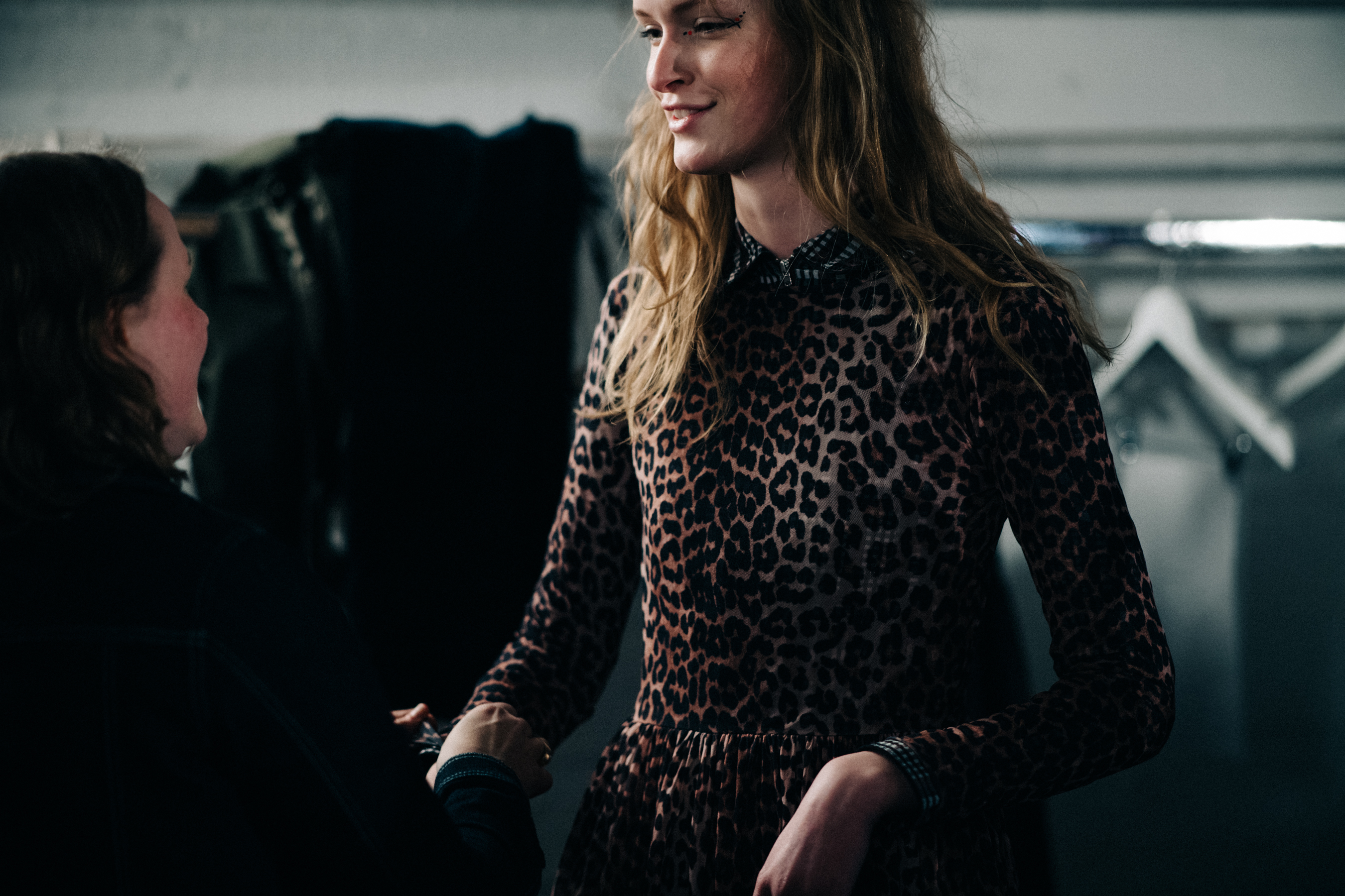 Model wearing animal print top