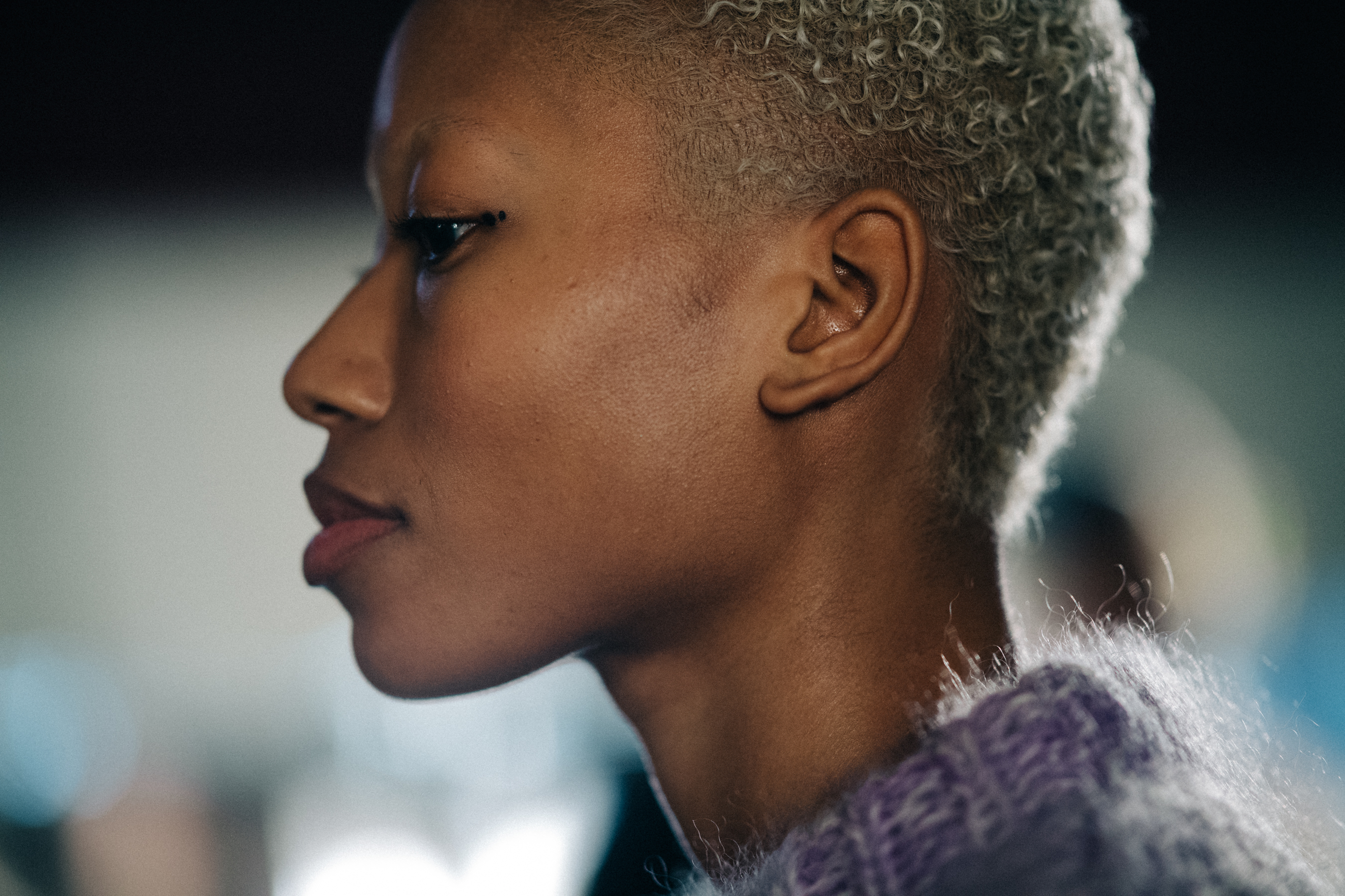 Model with short white hair