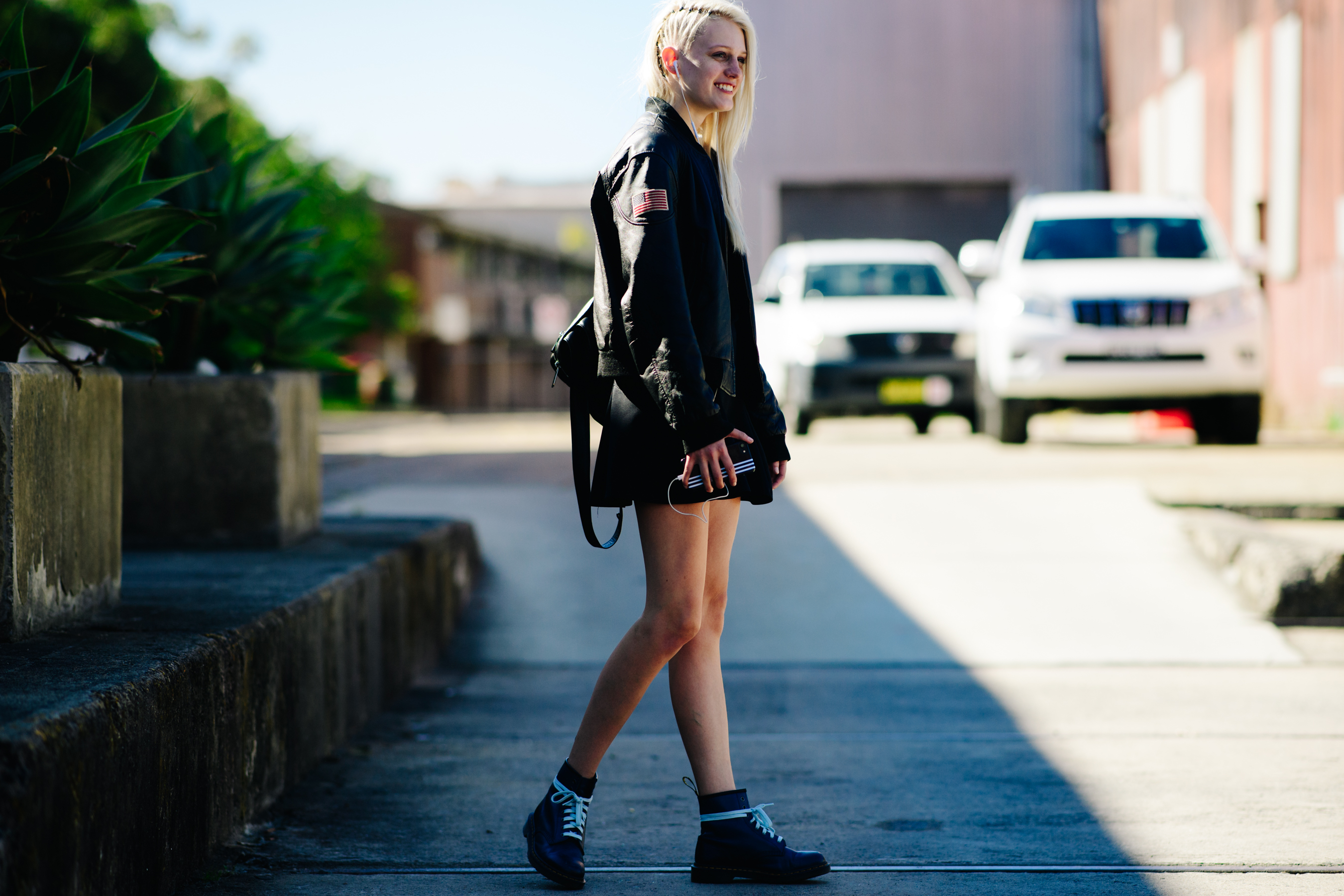 Girl wearing a leather patch jacket