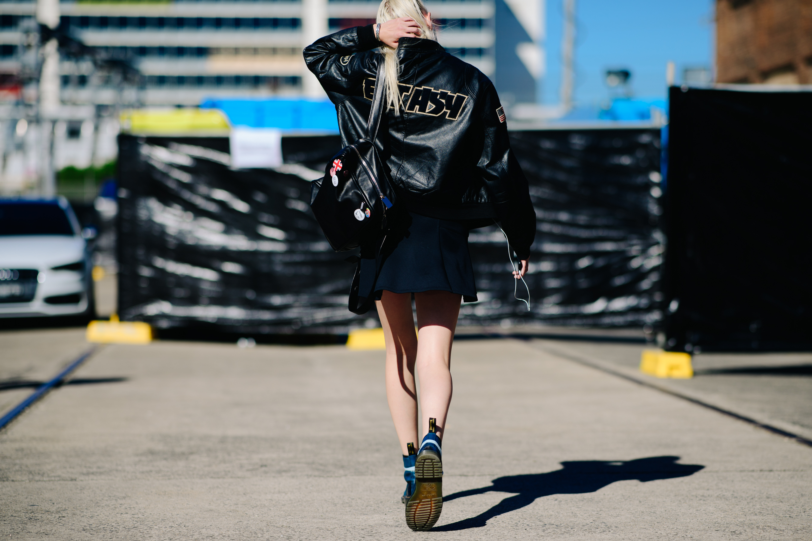 Girl wearing a leather patch jacket