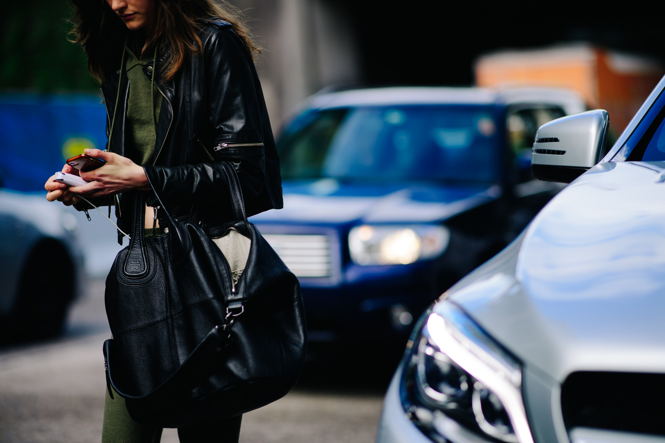 Woman wearing a short leather jacket