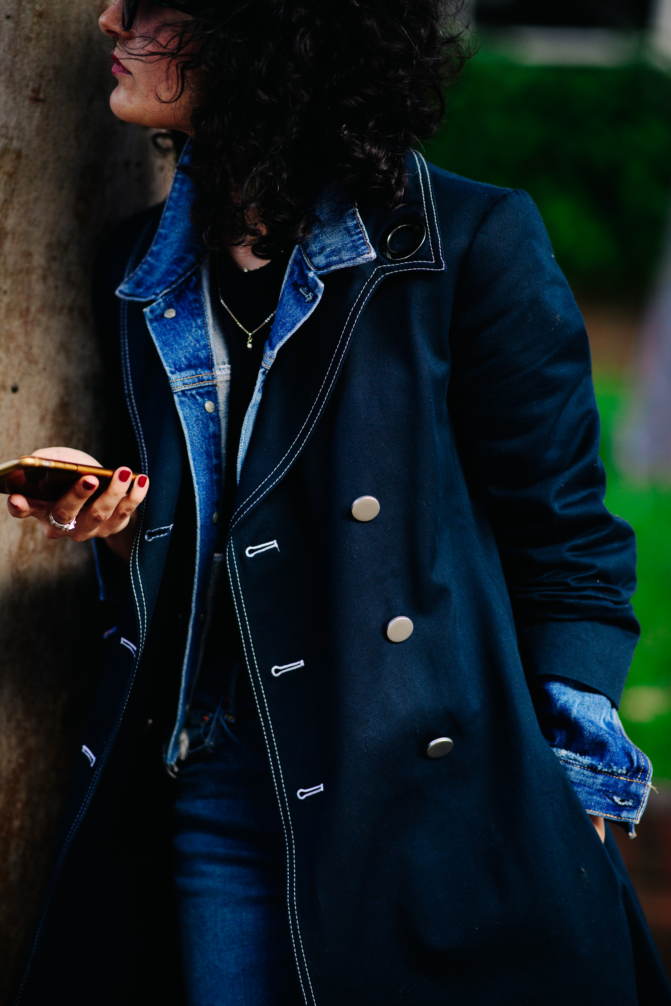 Woman wearing two layered jackets