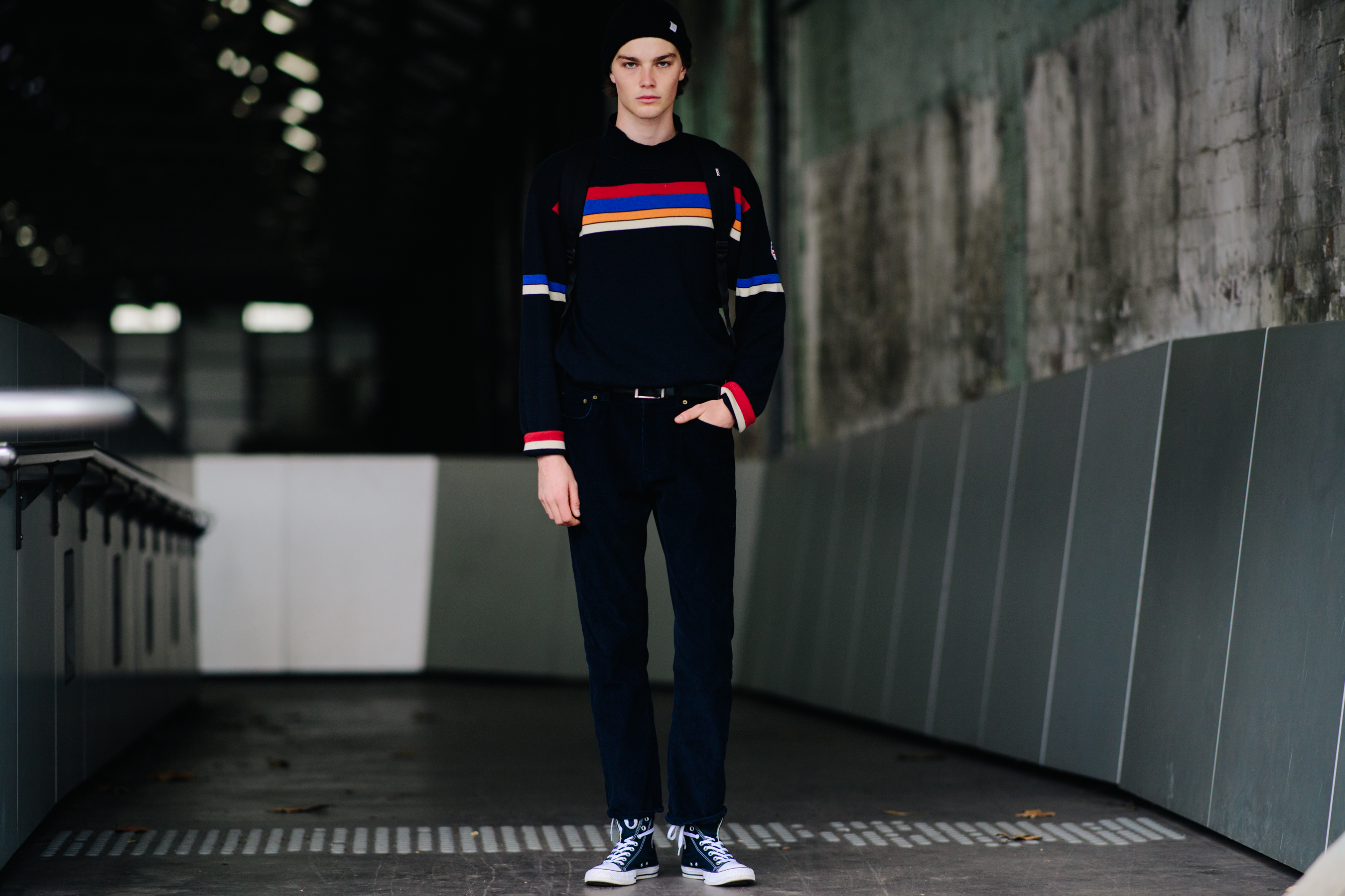 Boy wearing a multicolored sweater