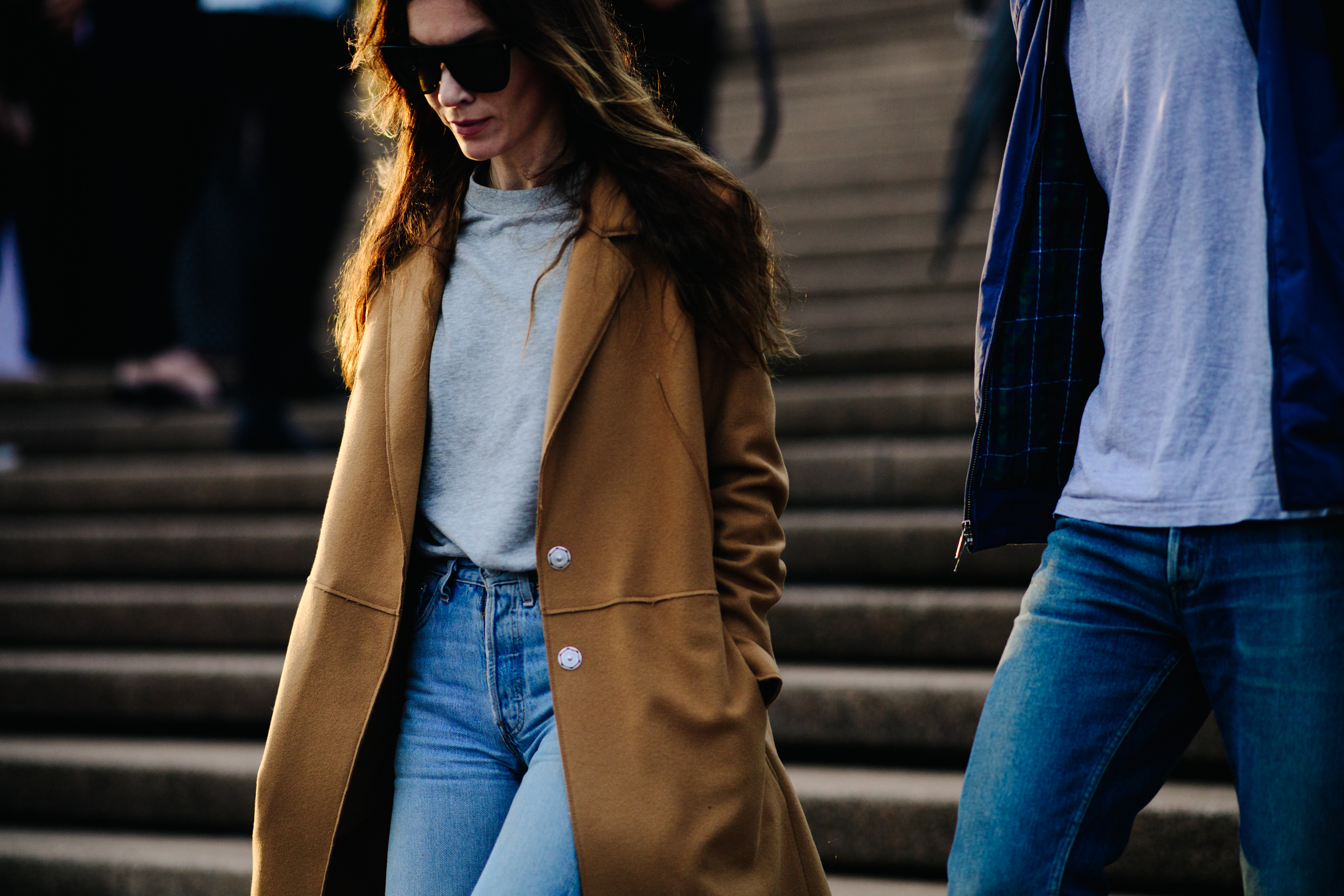 Woman wearing camel coat