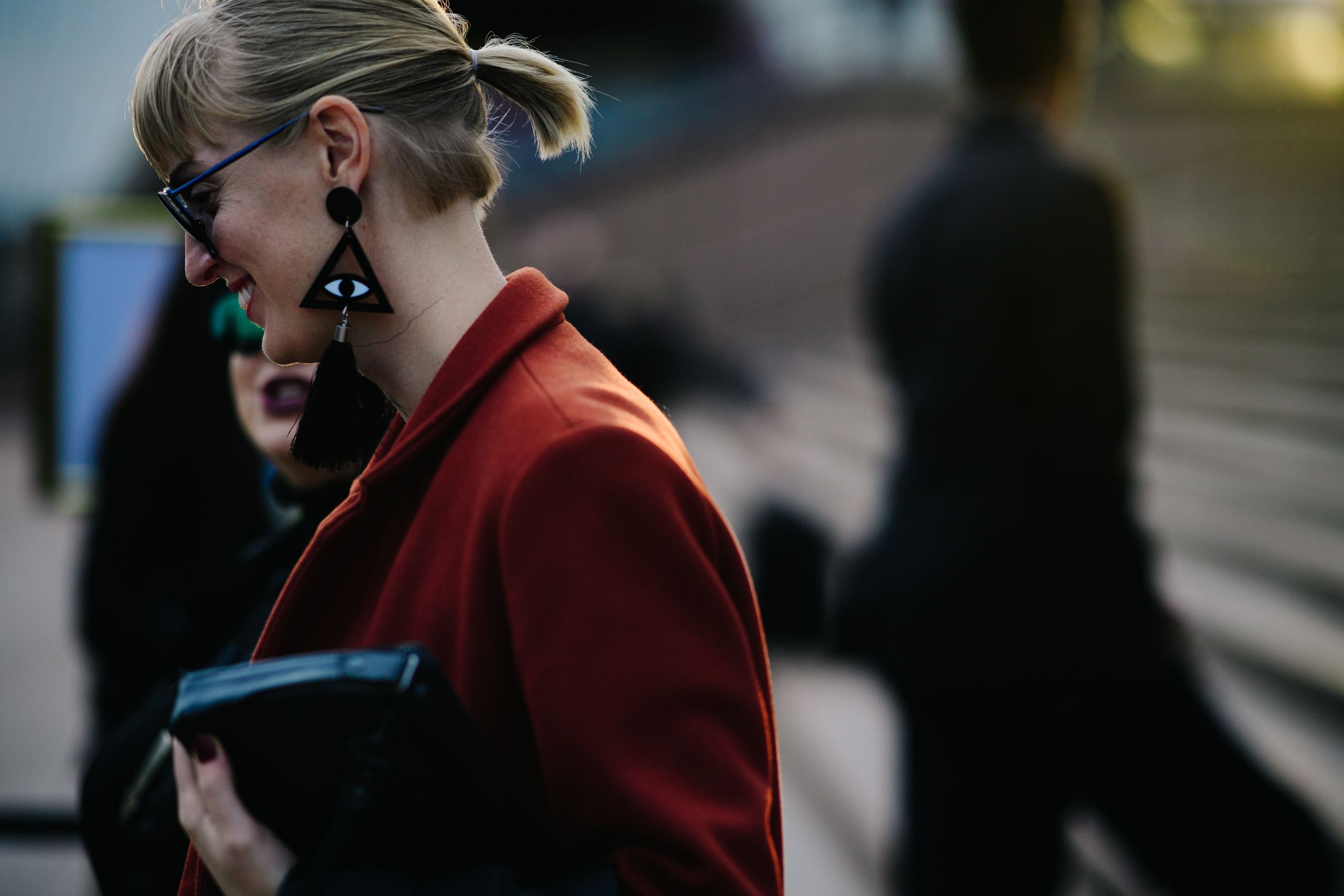 Woman wearing earring with an eye