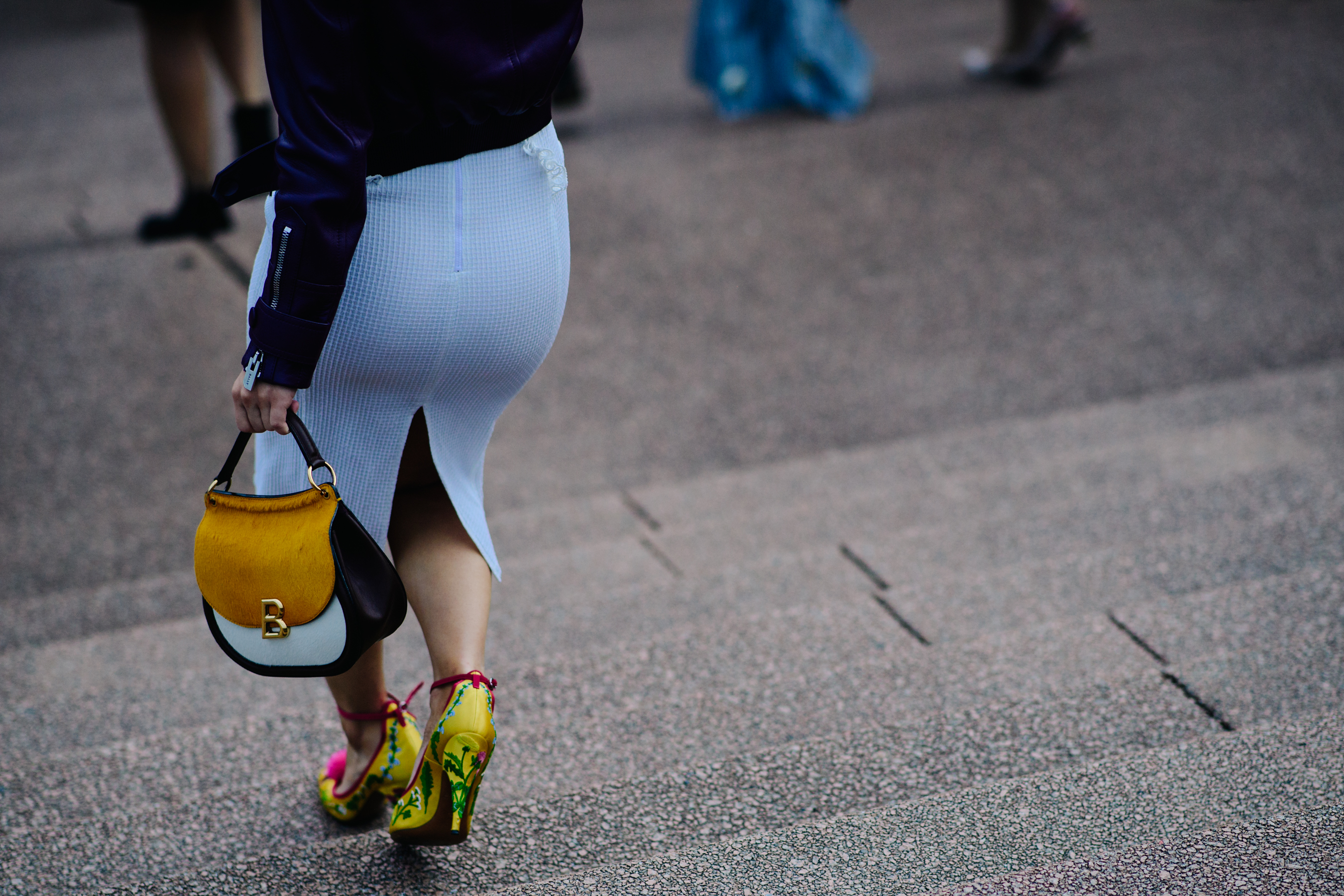 Woman wearing yellow shoes