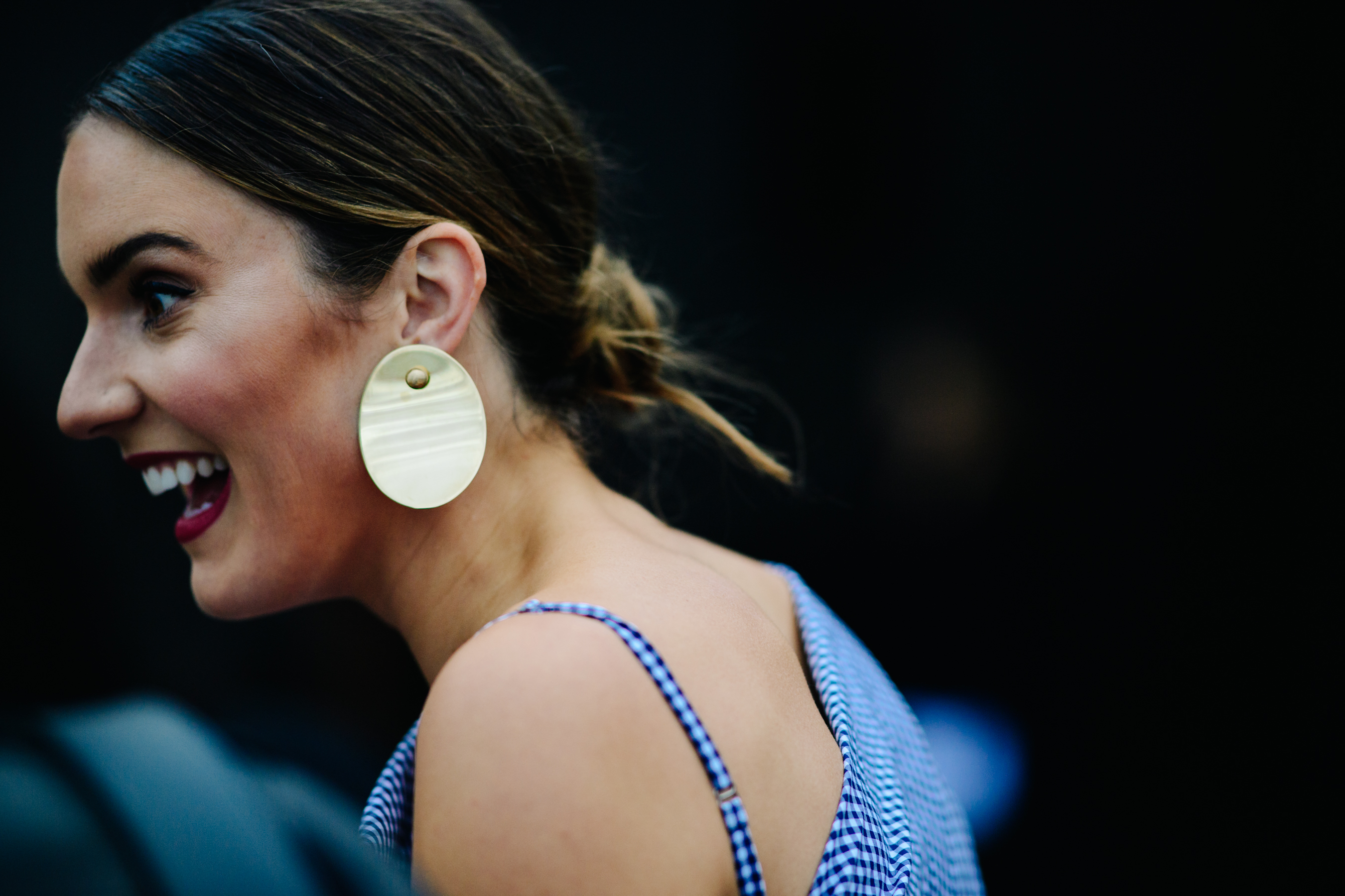 Woman wearing golden earring