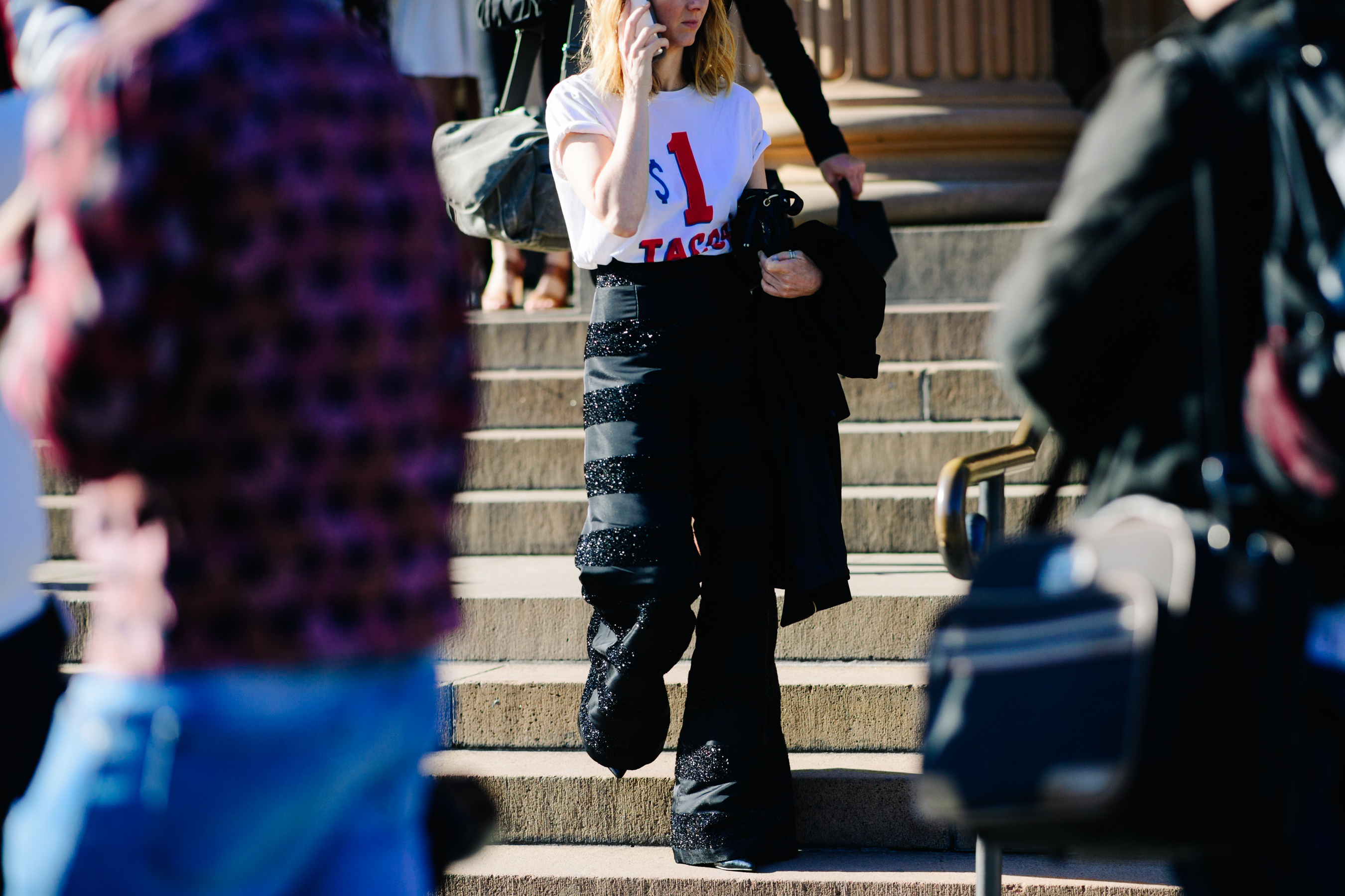 Woman wearing large beaded pants