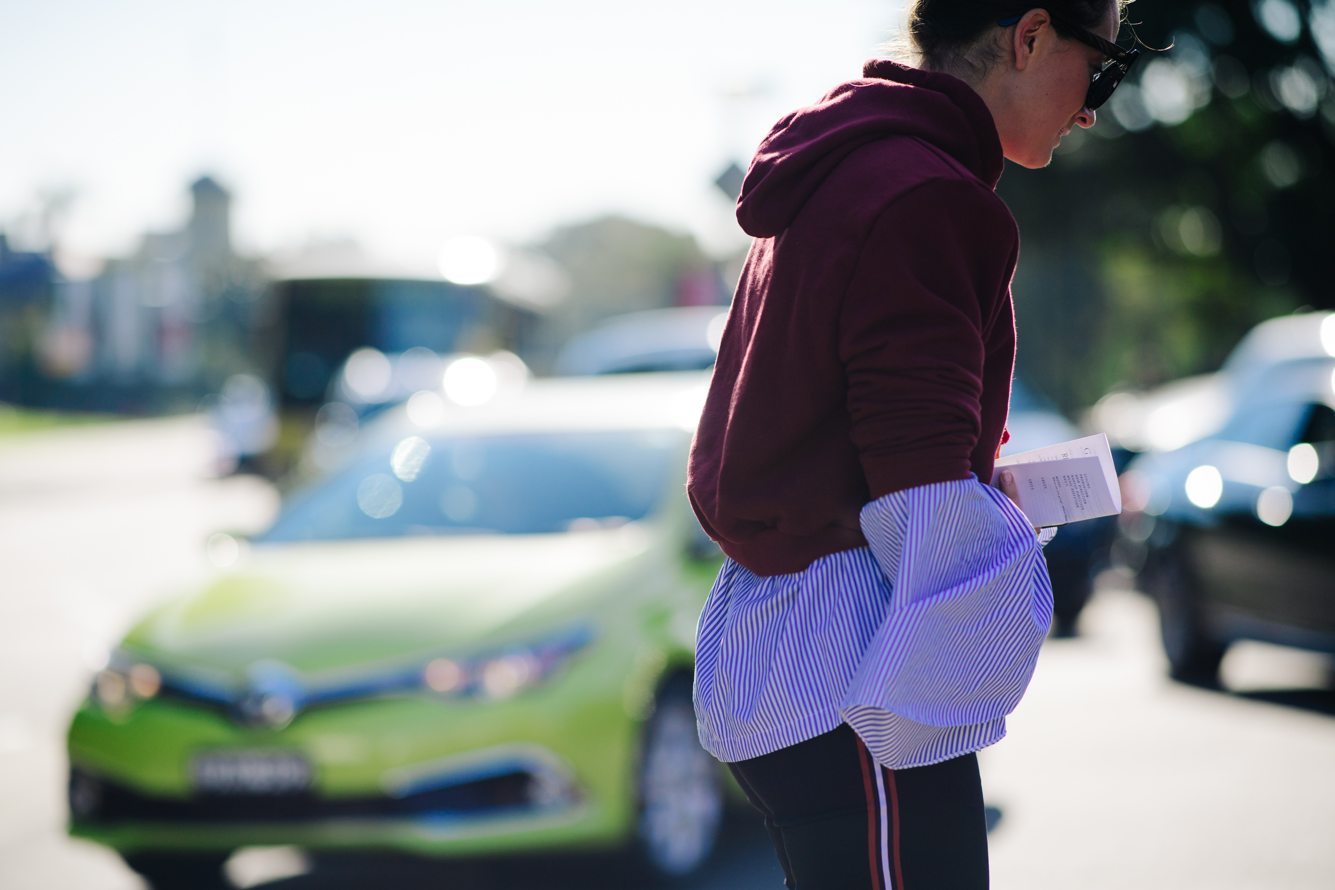 Girl wearing a burgundy hoodie