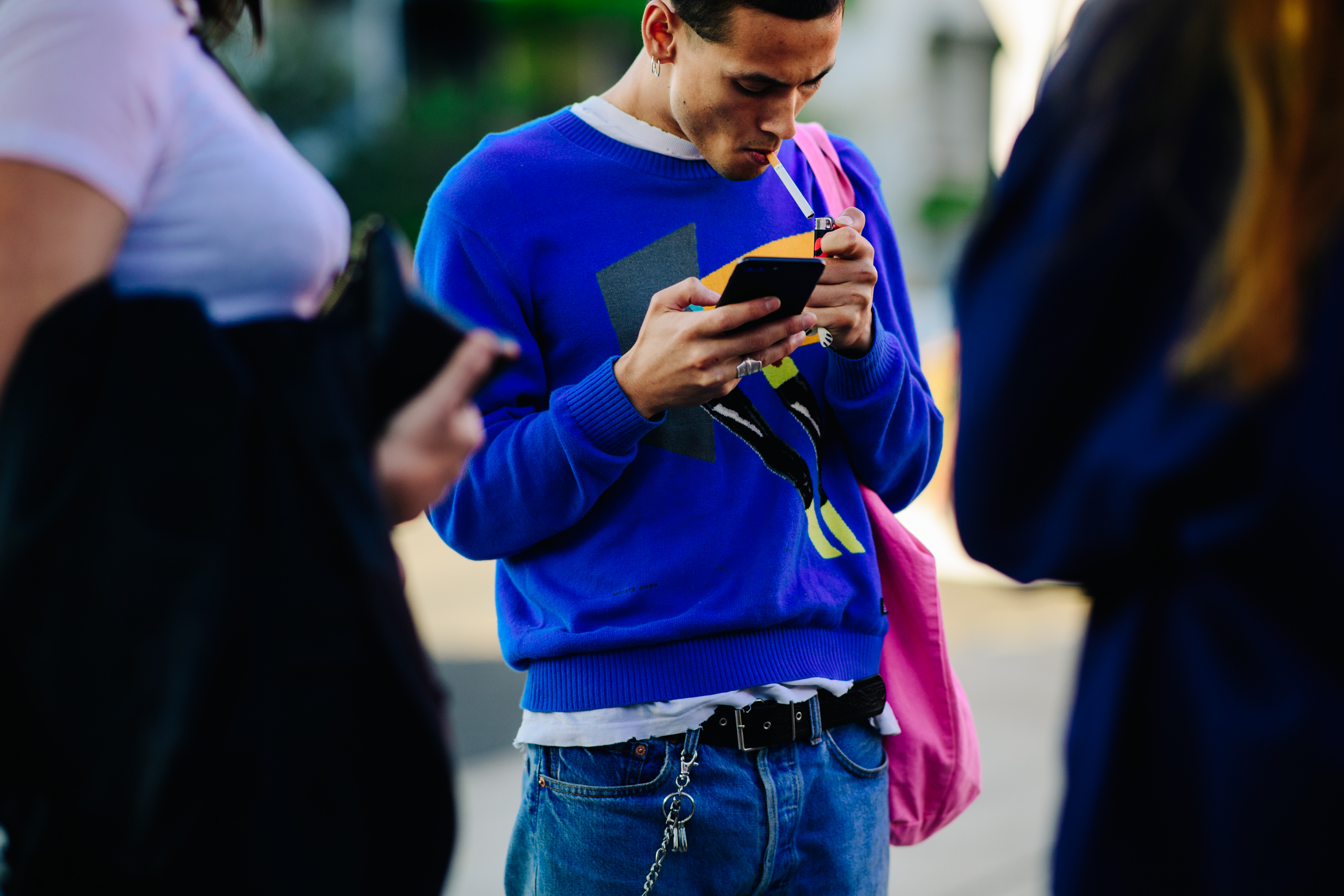Male model wearing blue sweater