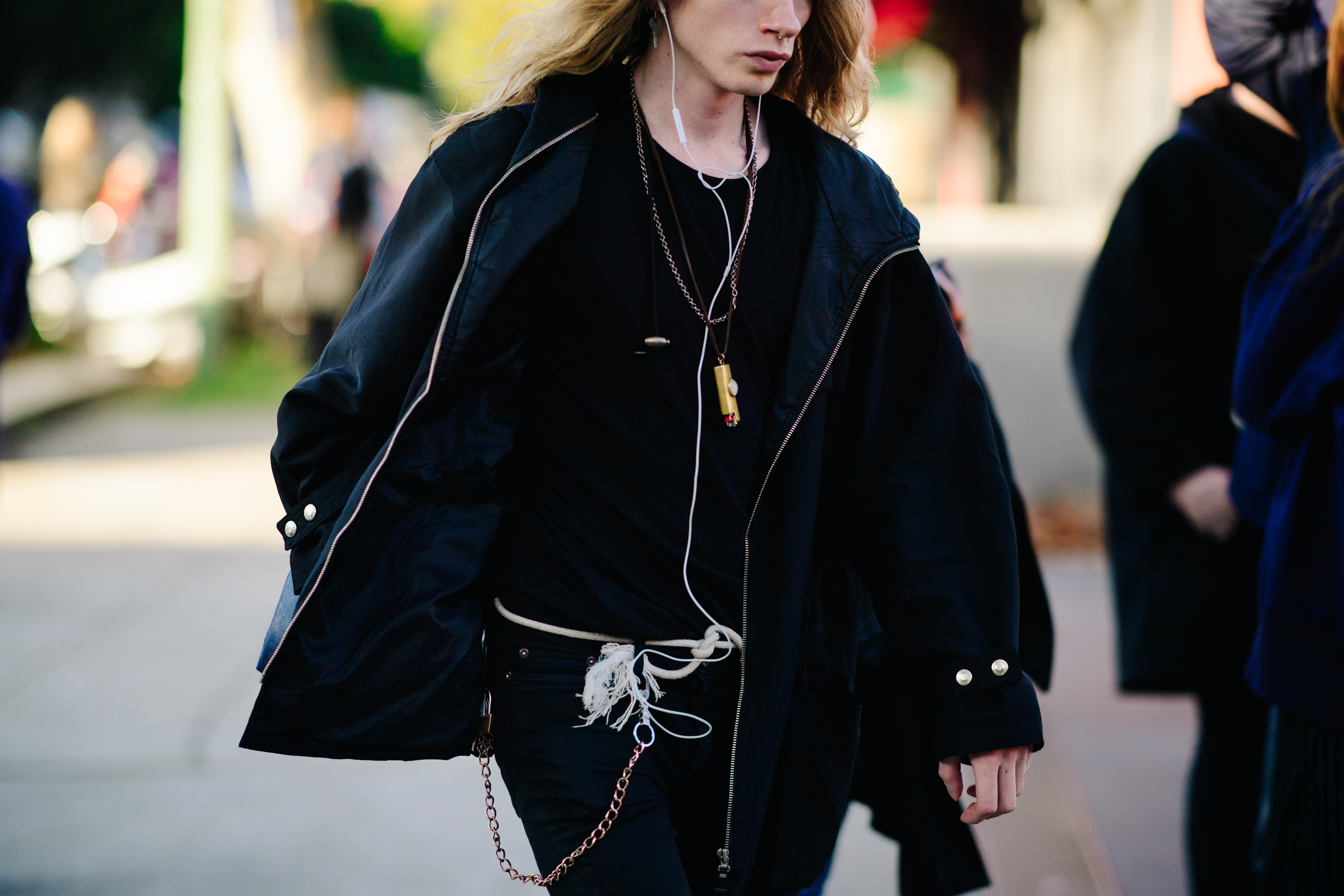 Man with long hair and piercing