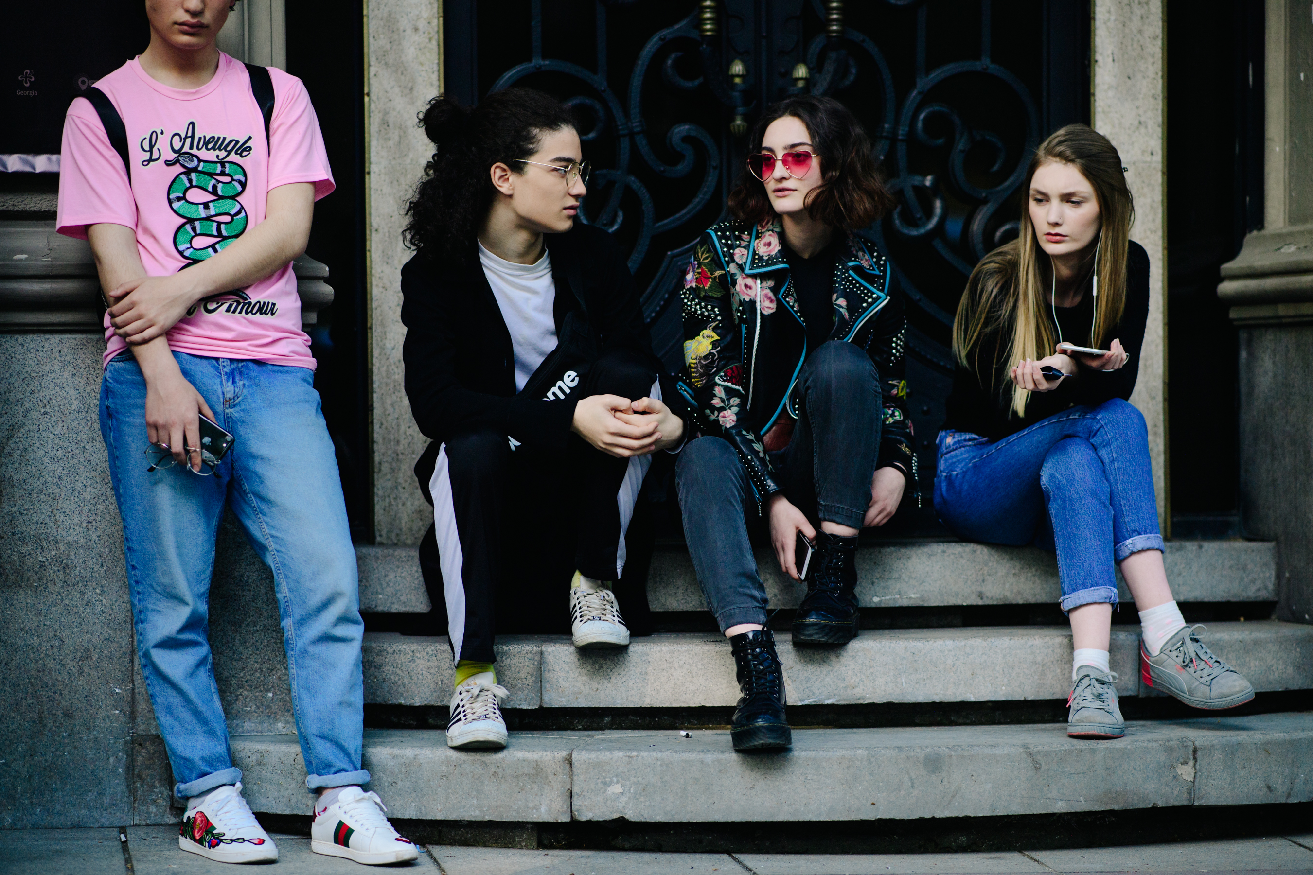 Young people sitting on the stairs