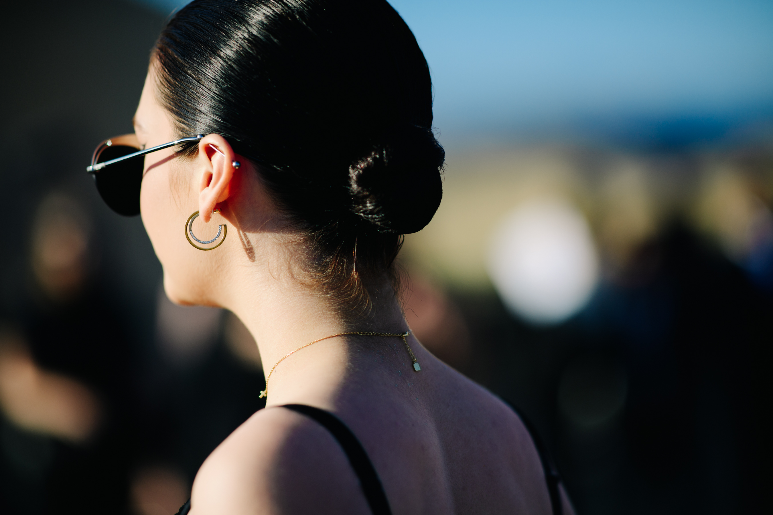 Woman wearing a double earring