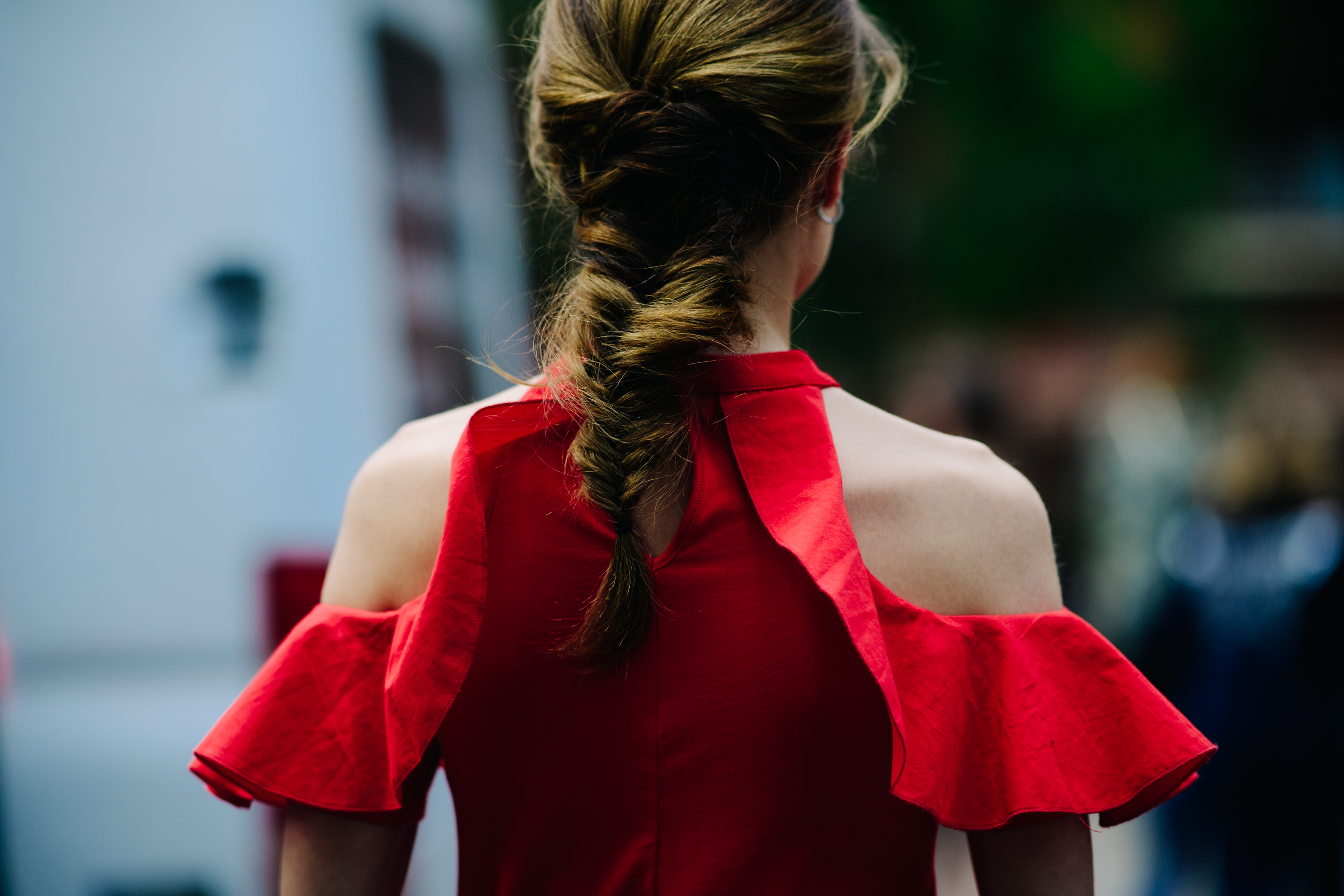 Young girl wearing a red top