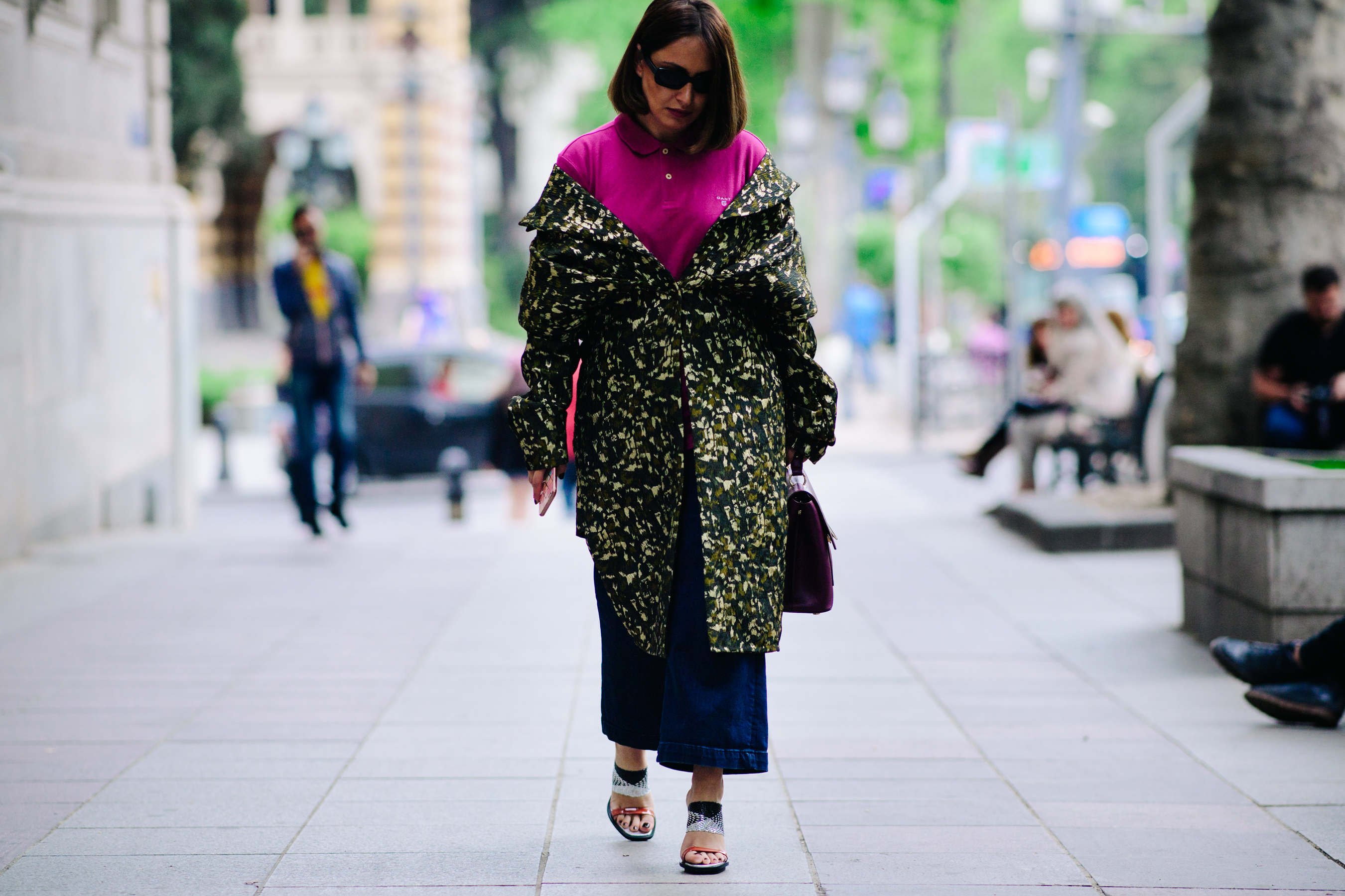 Woman wearing a camo long coat