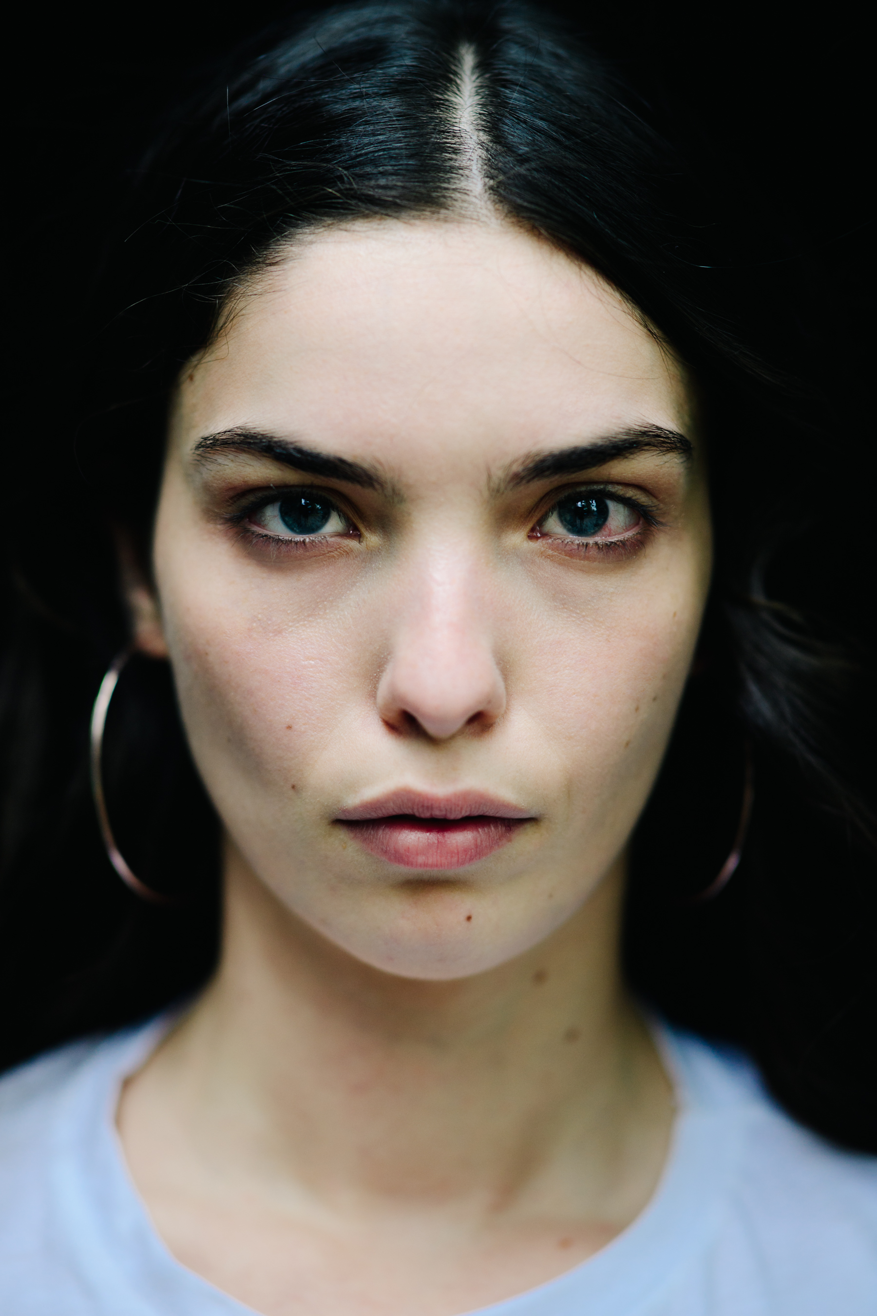 Portrait of a girl wearing big earrings
