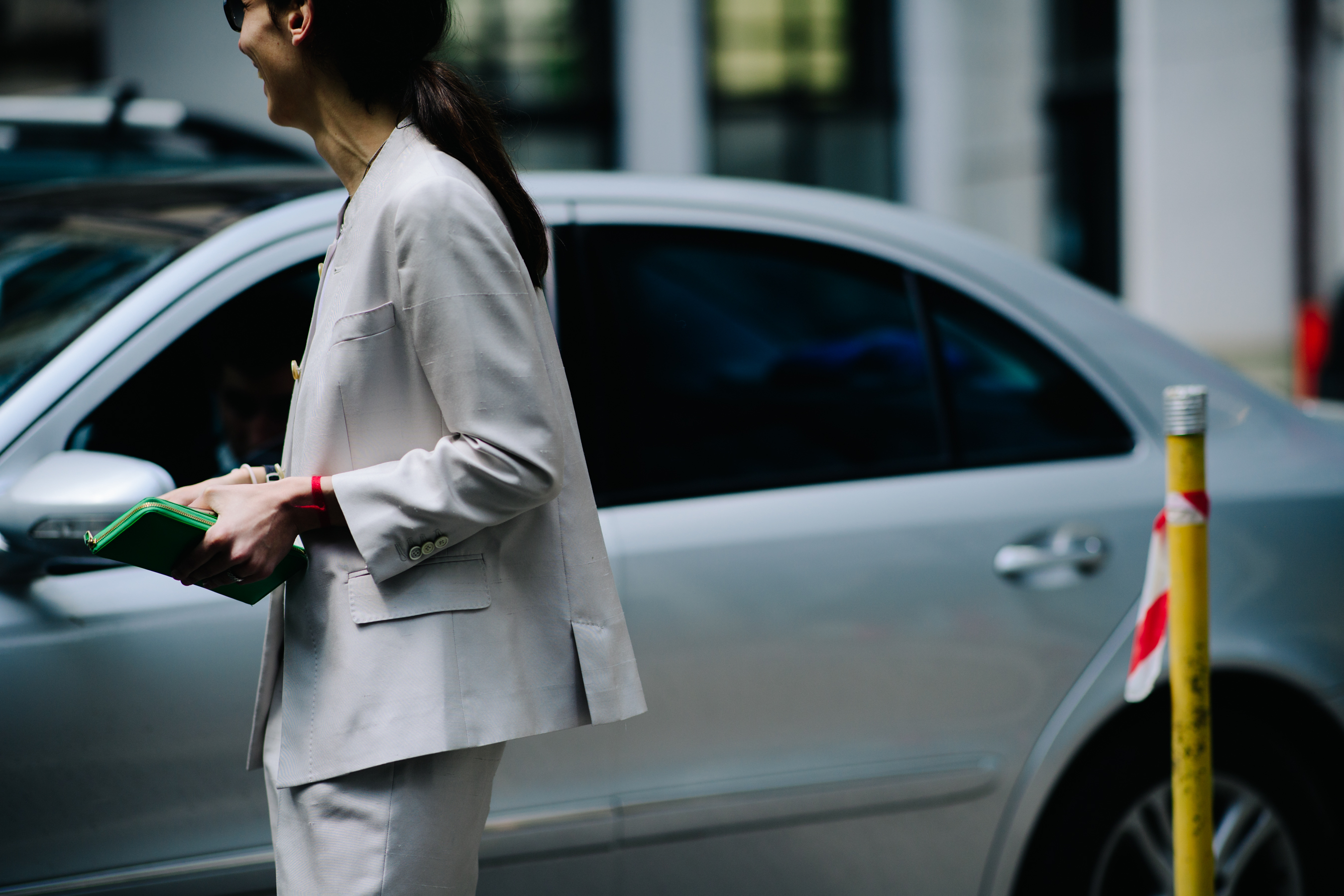 Girl wearing a light beige suit