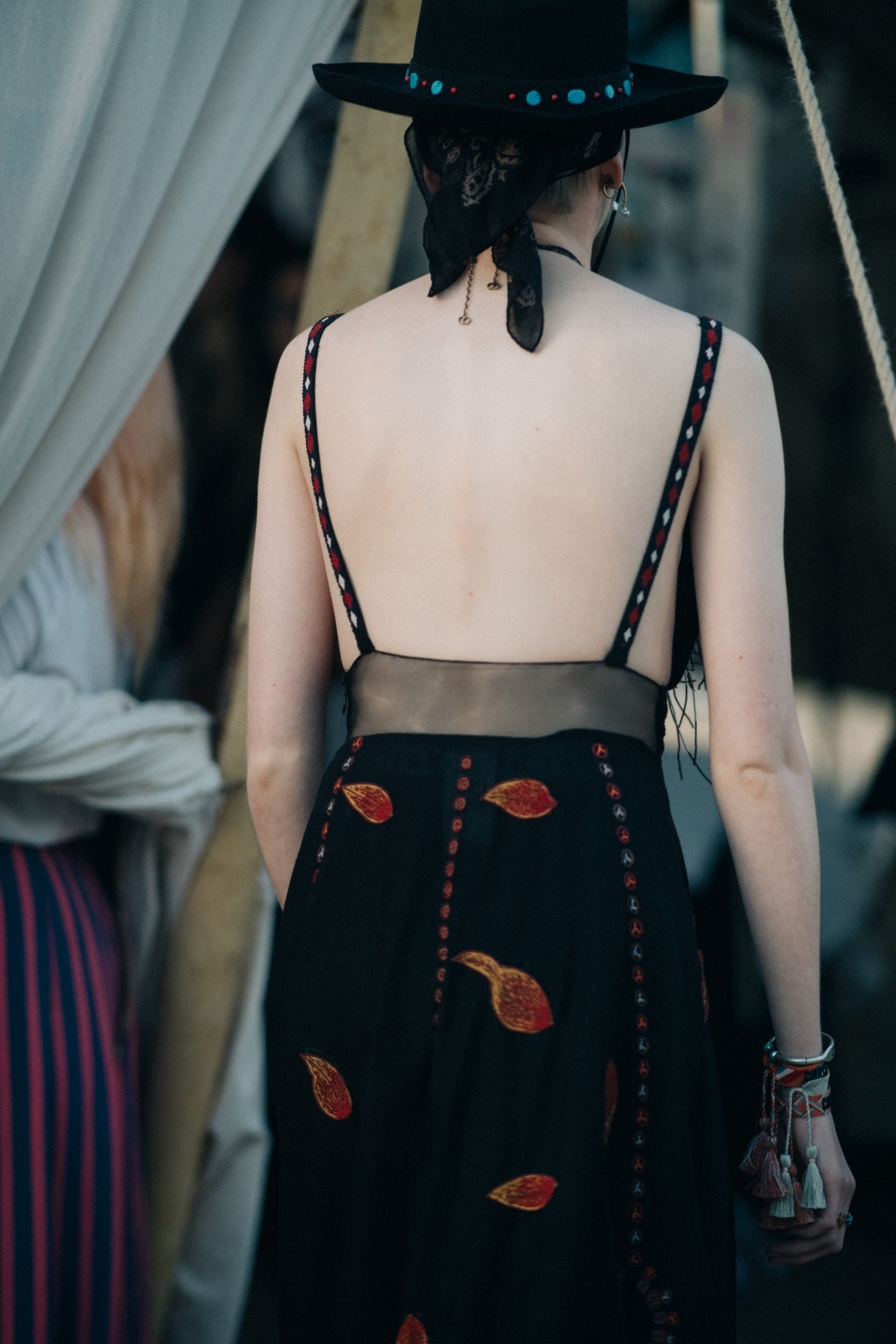 Girl wearing a black Dior dress