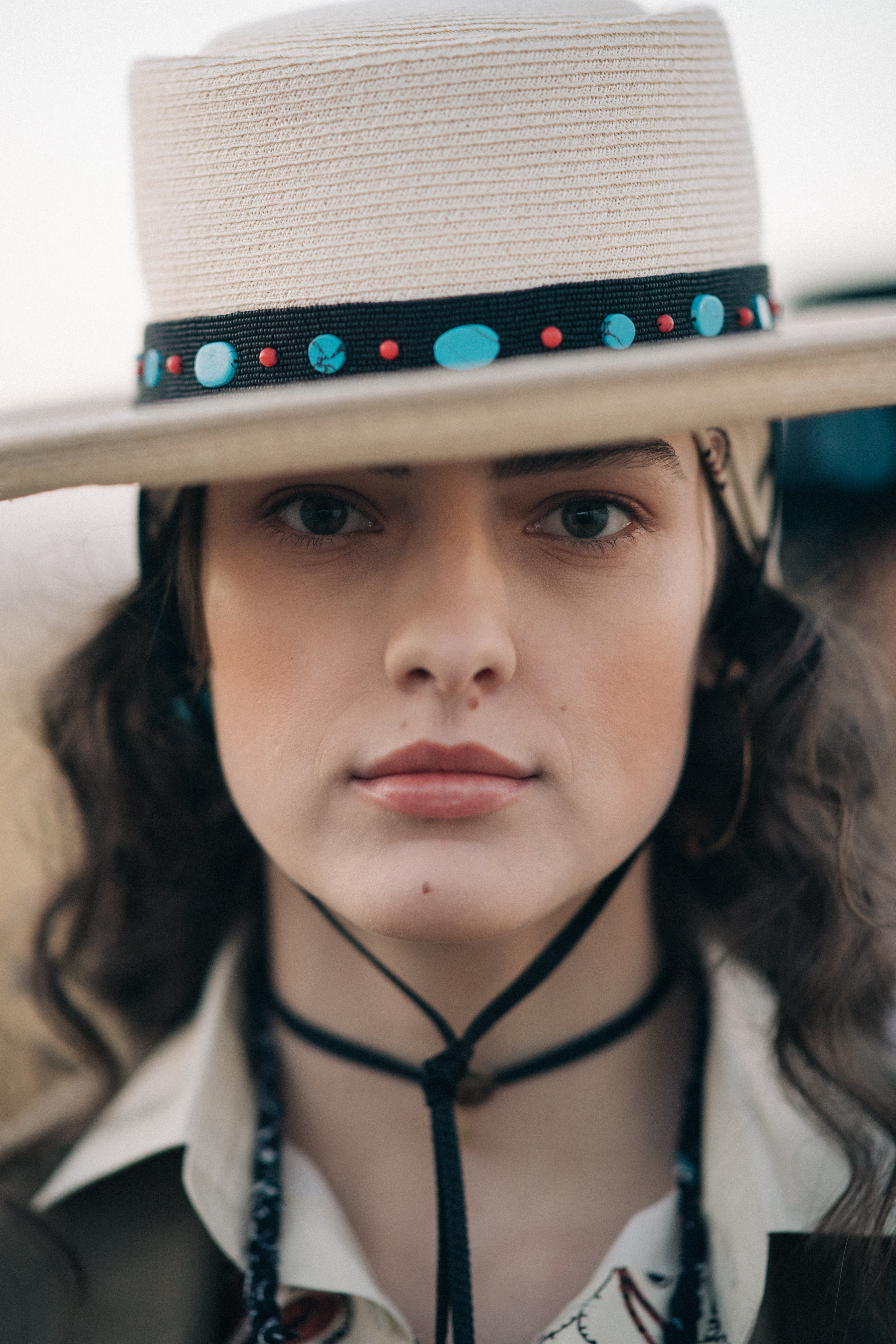 Portrait of a girl with a hat