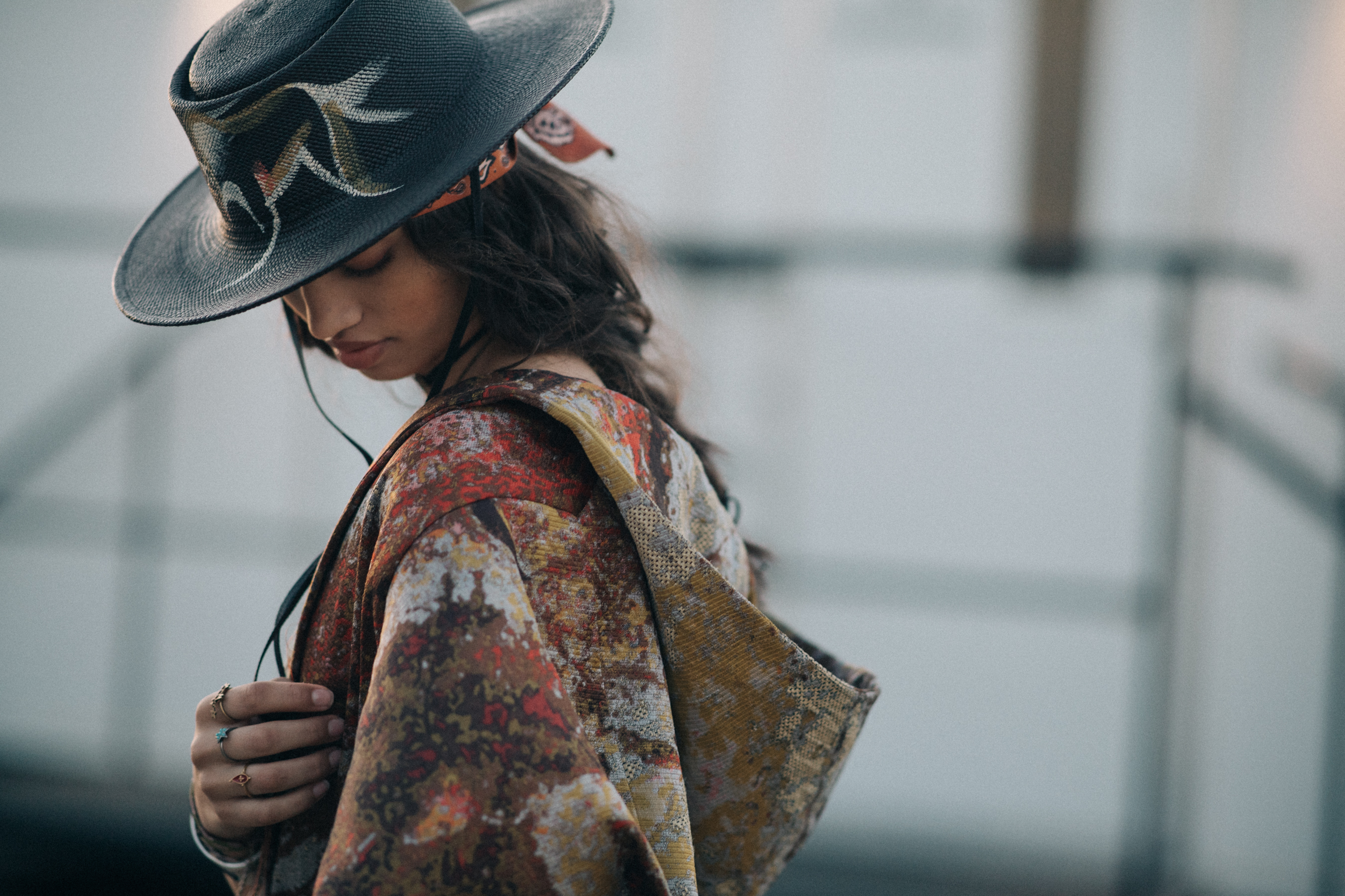 Female model wearing a multicolored coat