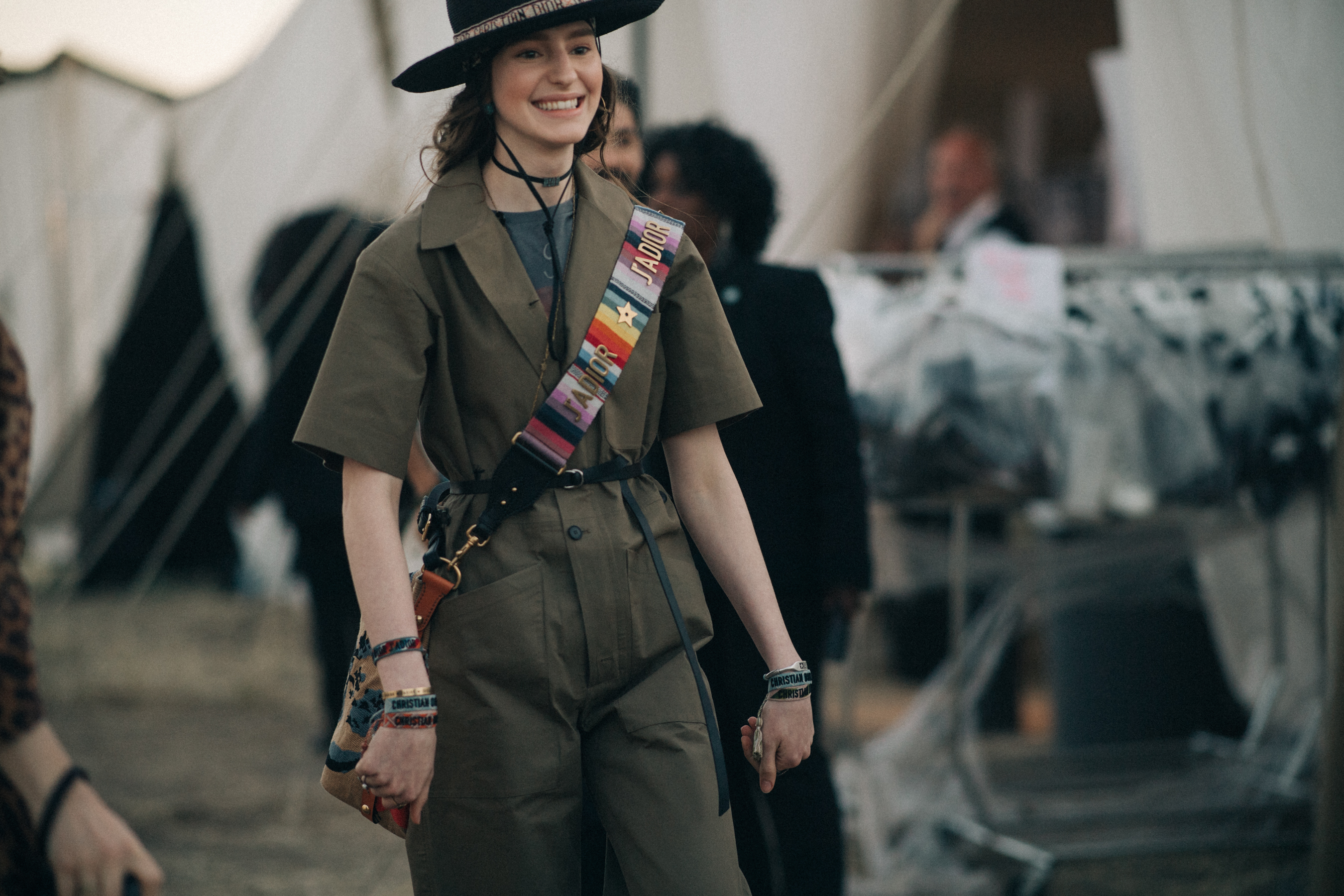 Smiling model wearing a khaki overall