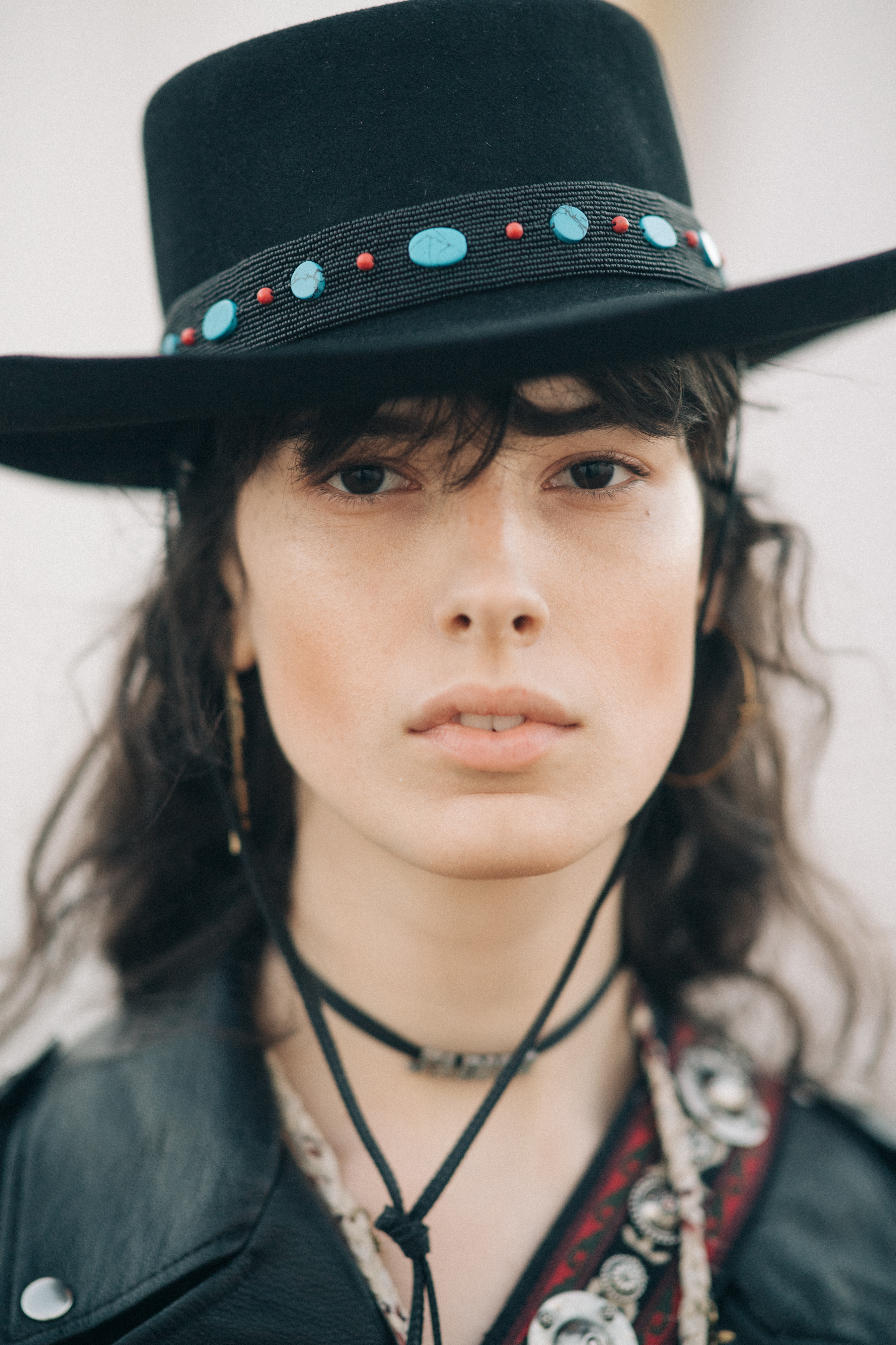 Girl wearing a tiny black choker