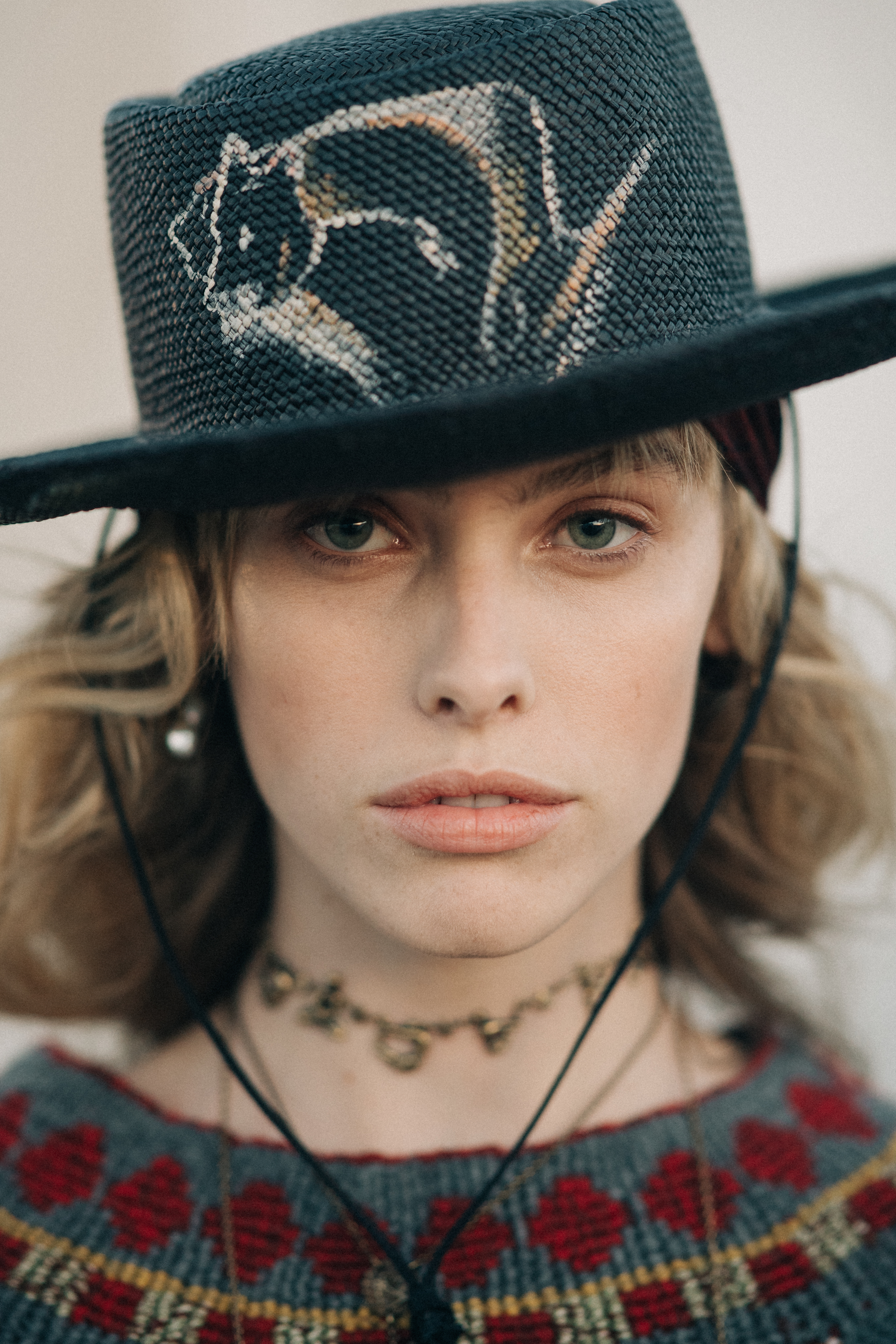 Girl wearing a ornament golden necklace