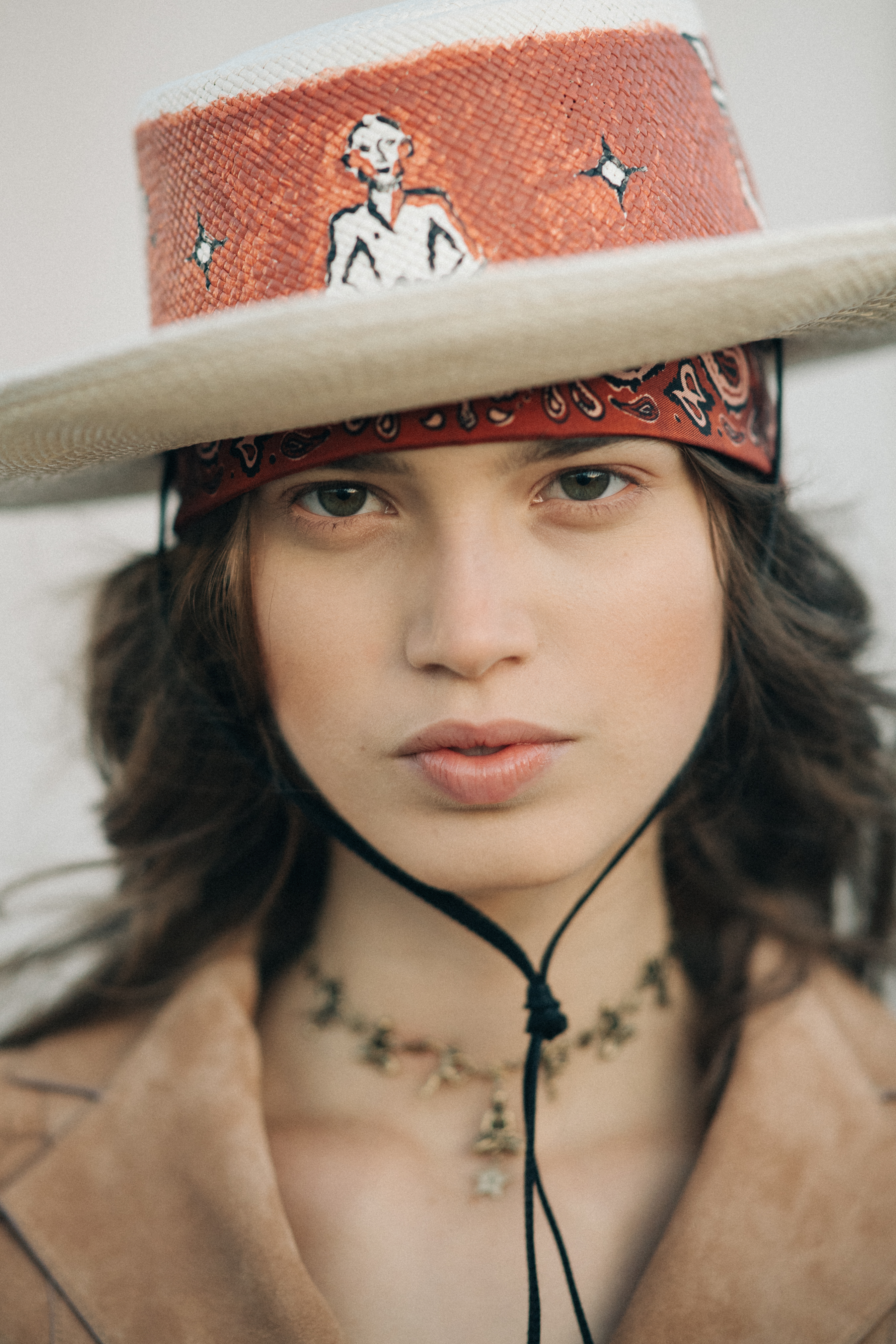 Girl wearing a golden necklace