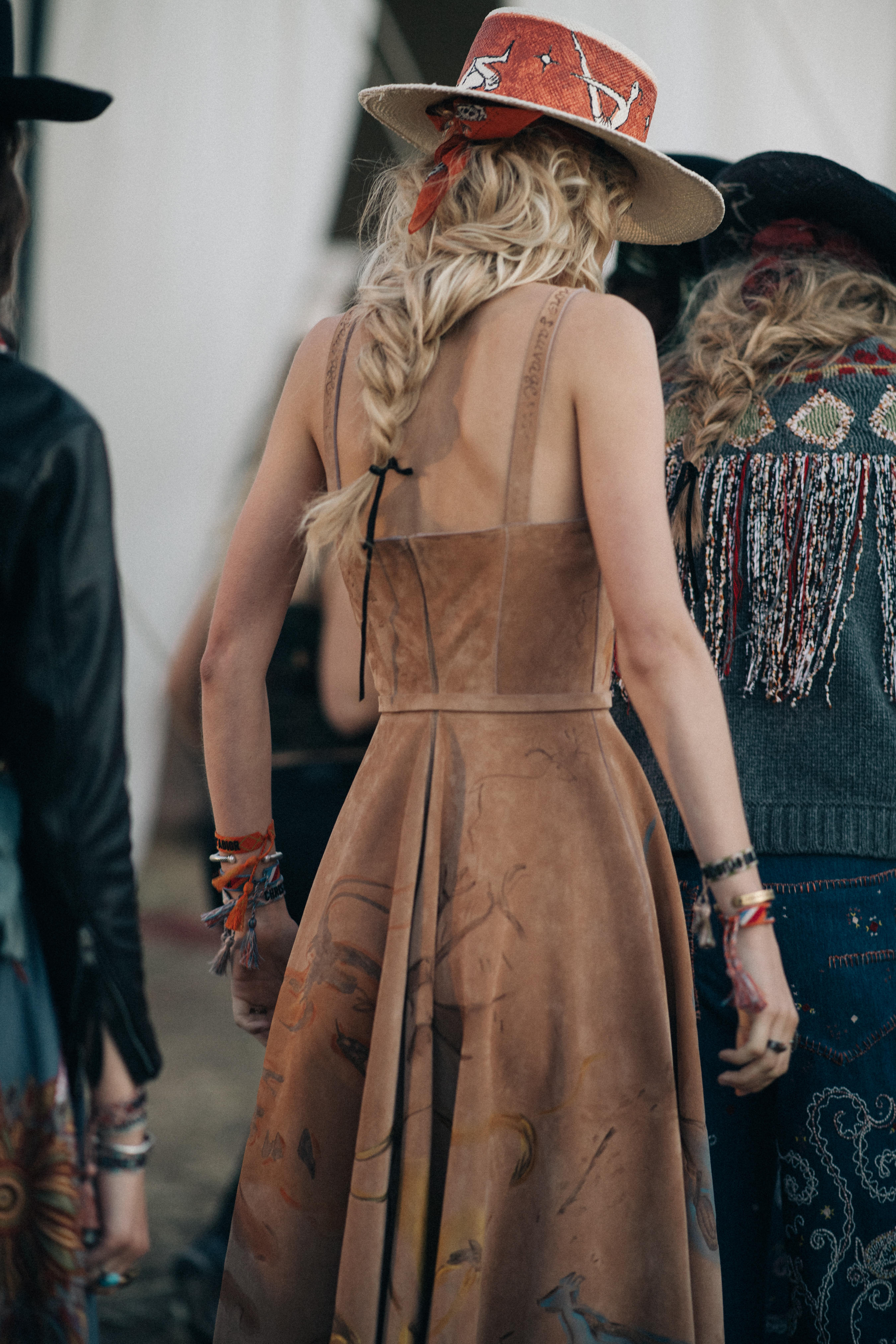 Girl wearing a brown suede dress