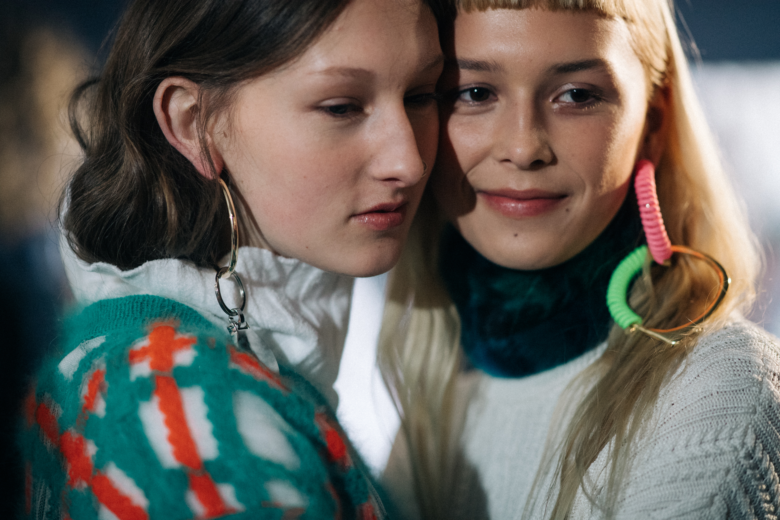 Two female models posing together