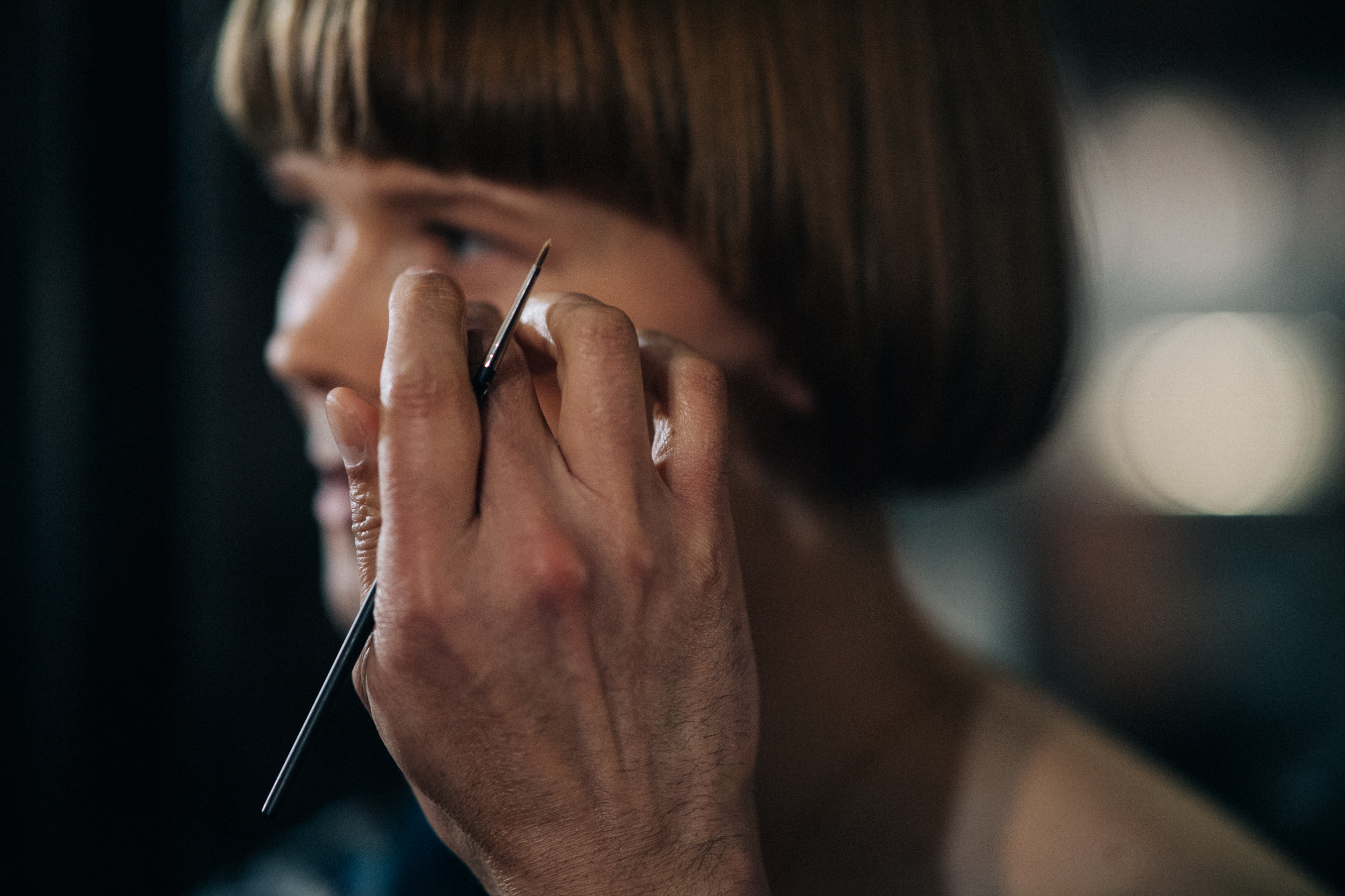 Detail of a make-up artist hand