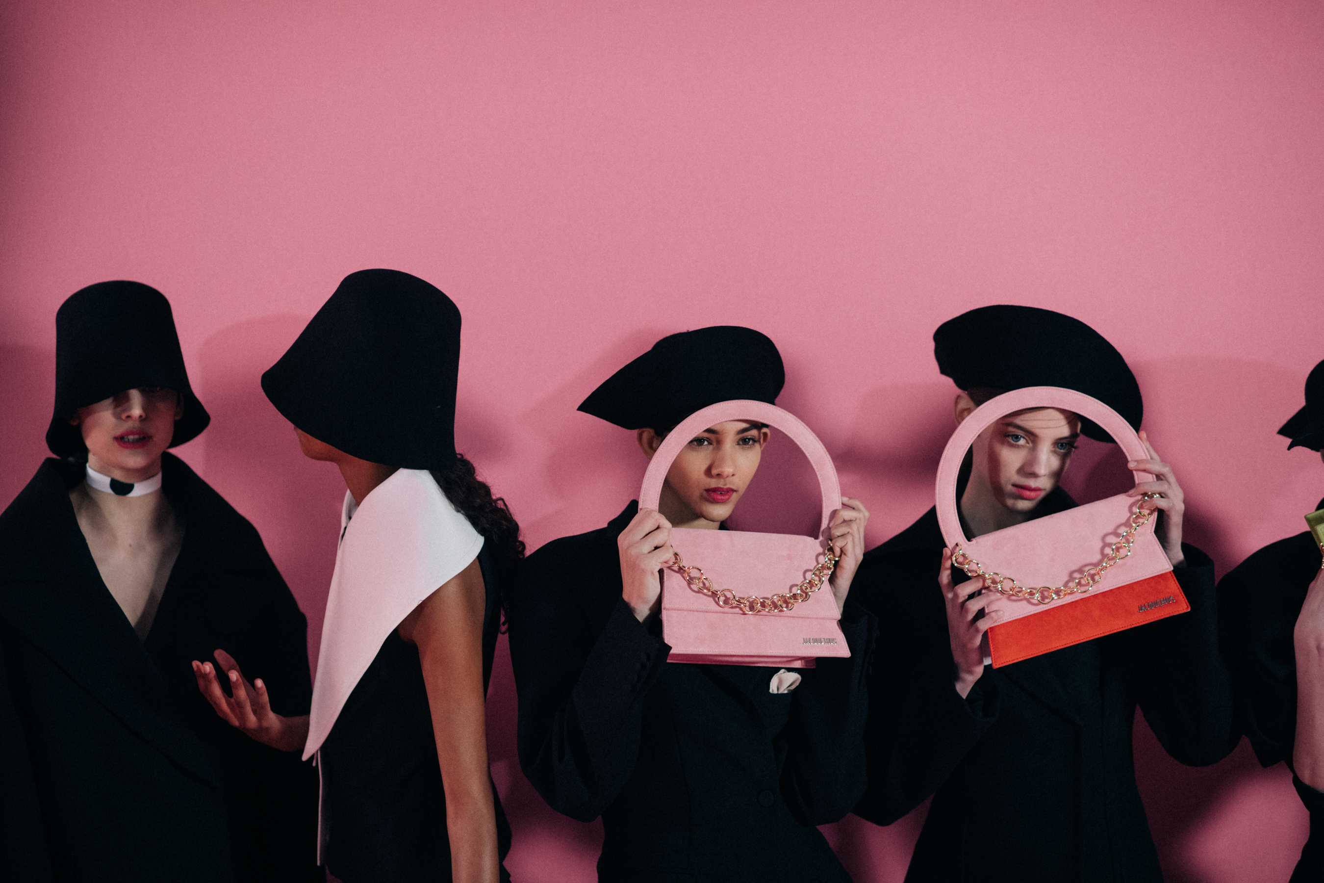 Girls holding their Jacquemus purses