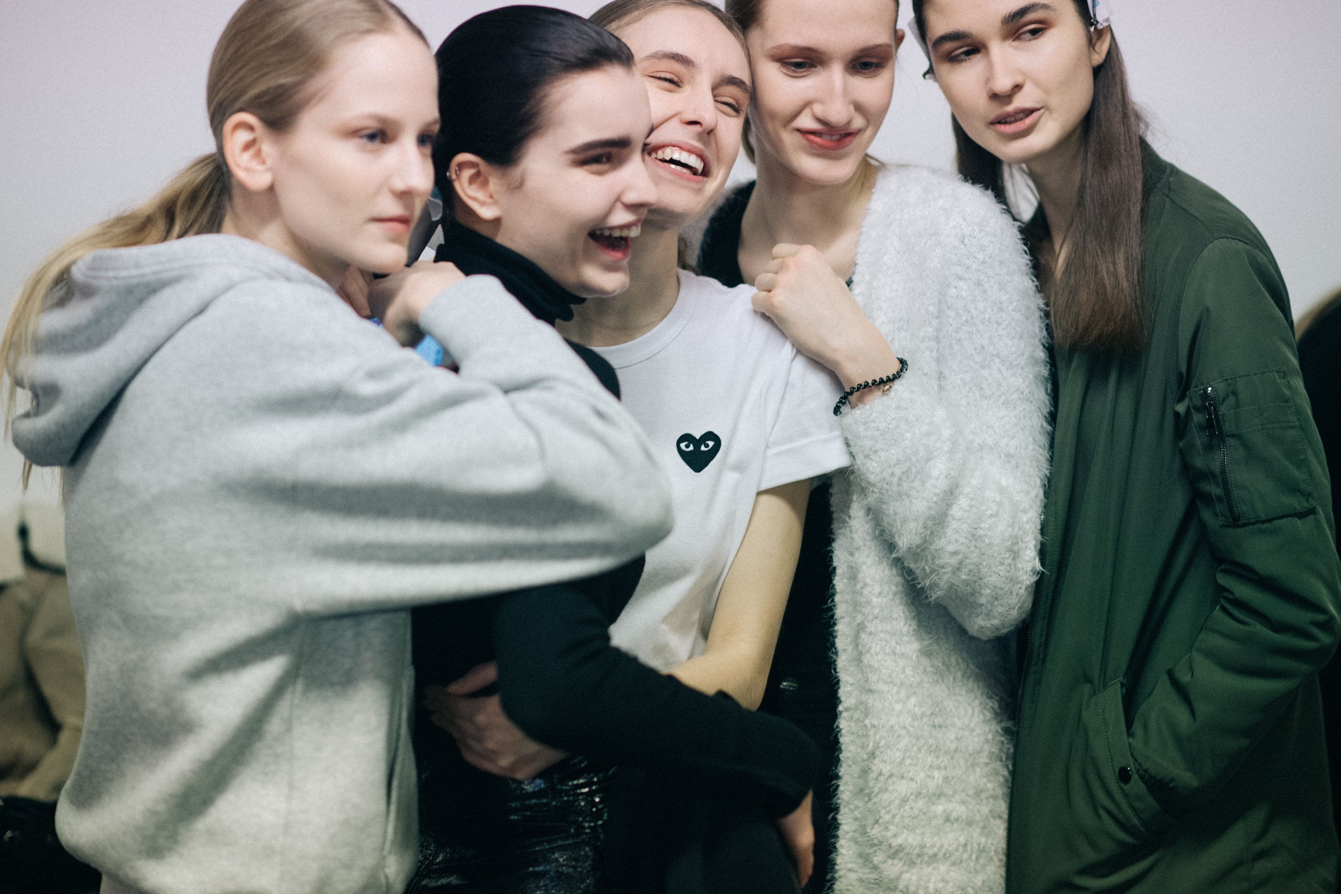 Five models posing at Nehera backstage