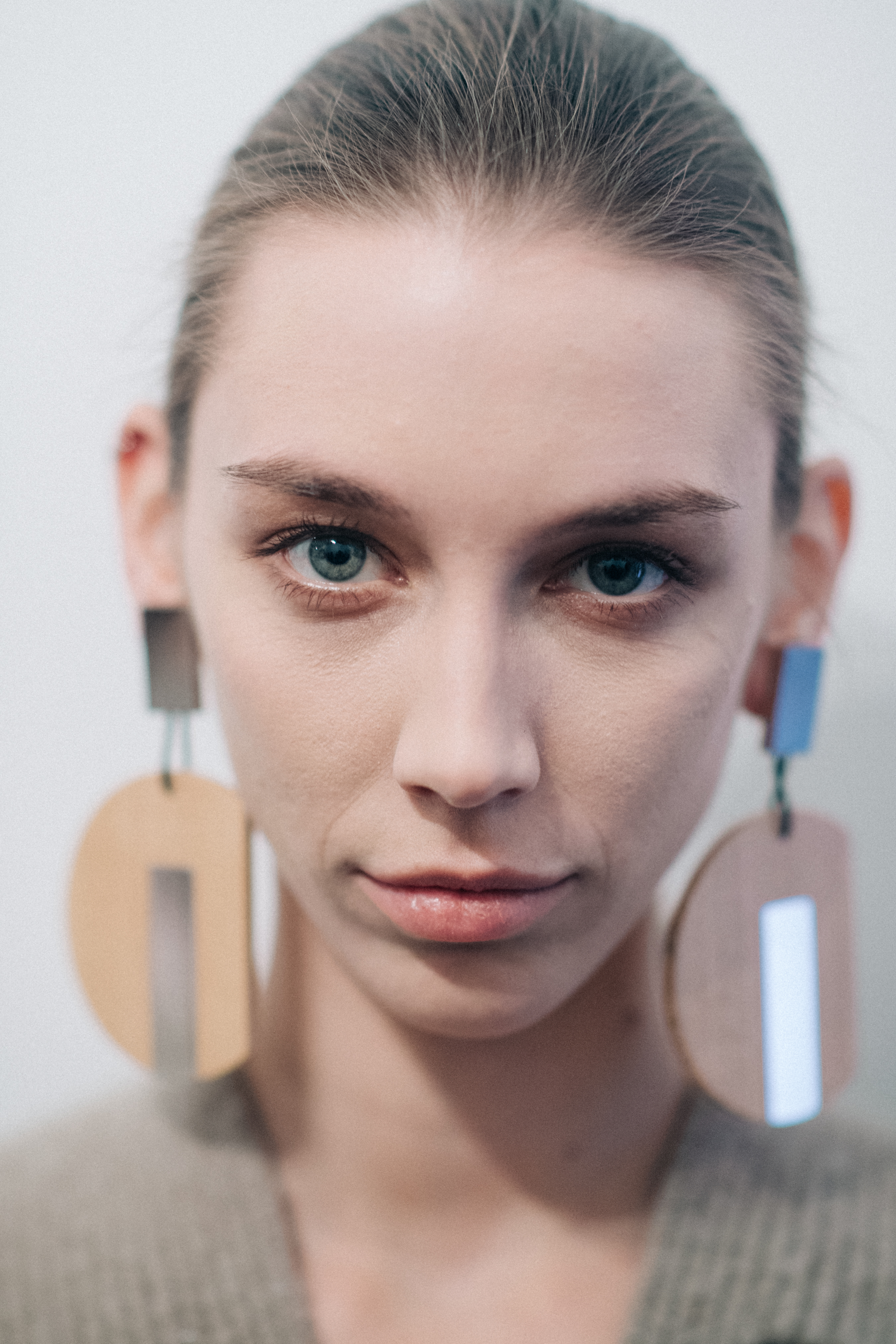 Portrait of a model wearing Nehera earrings