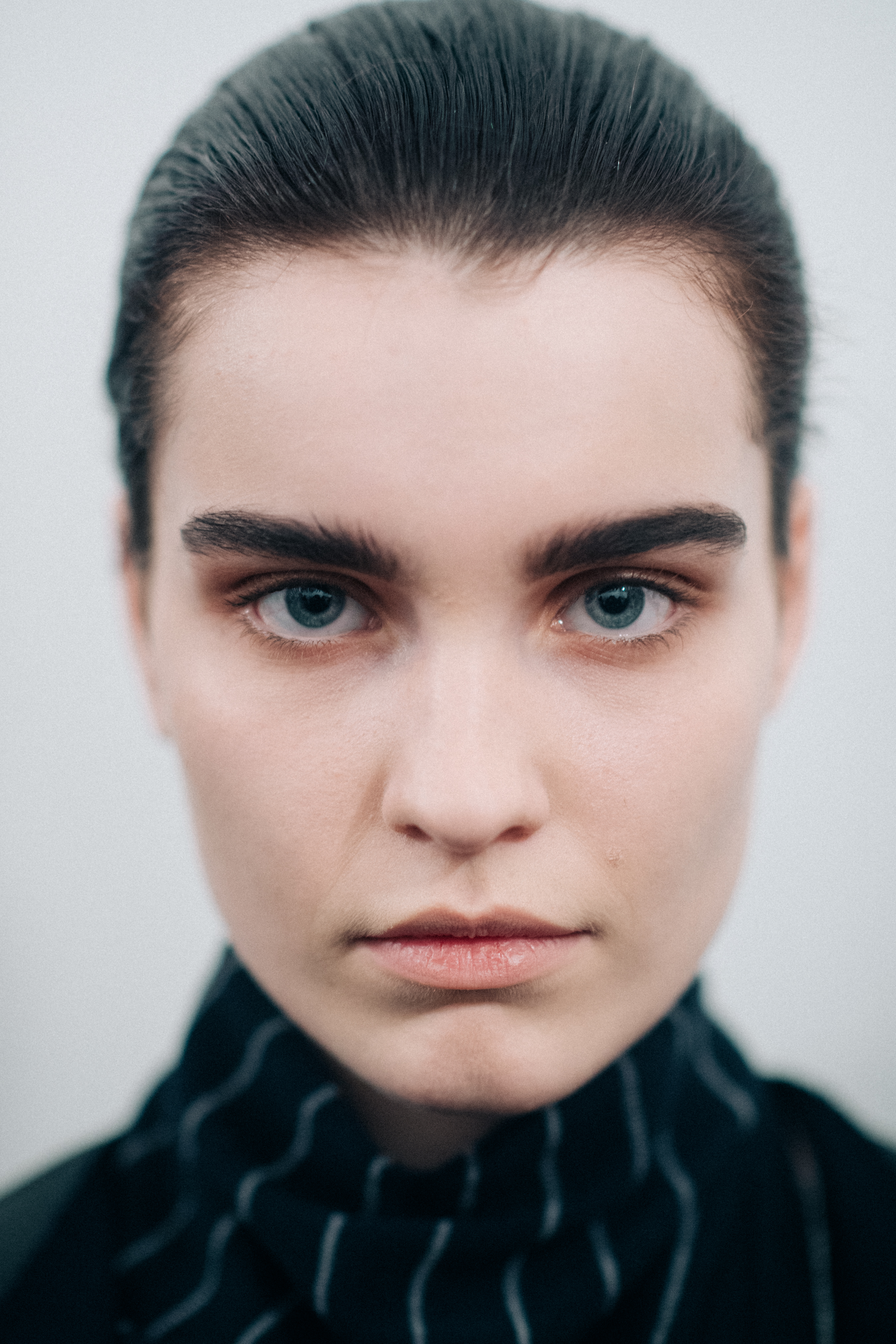 Portrait of a model wearing striped turtleneck