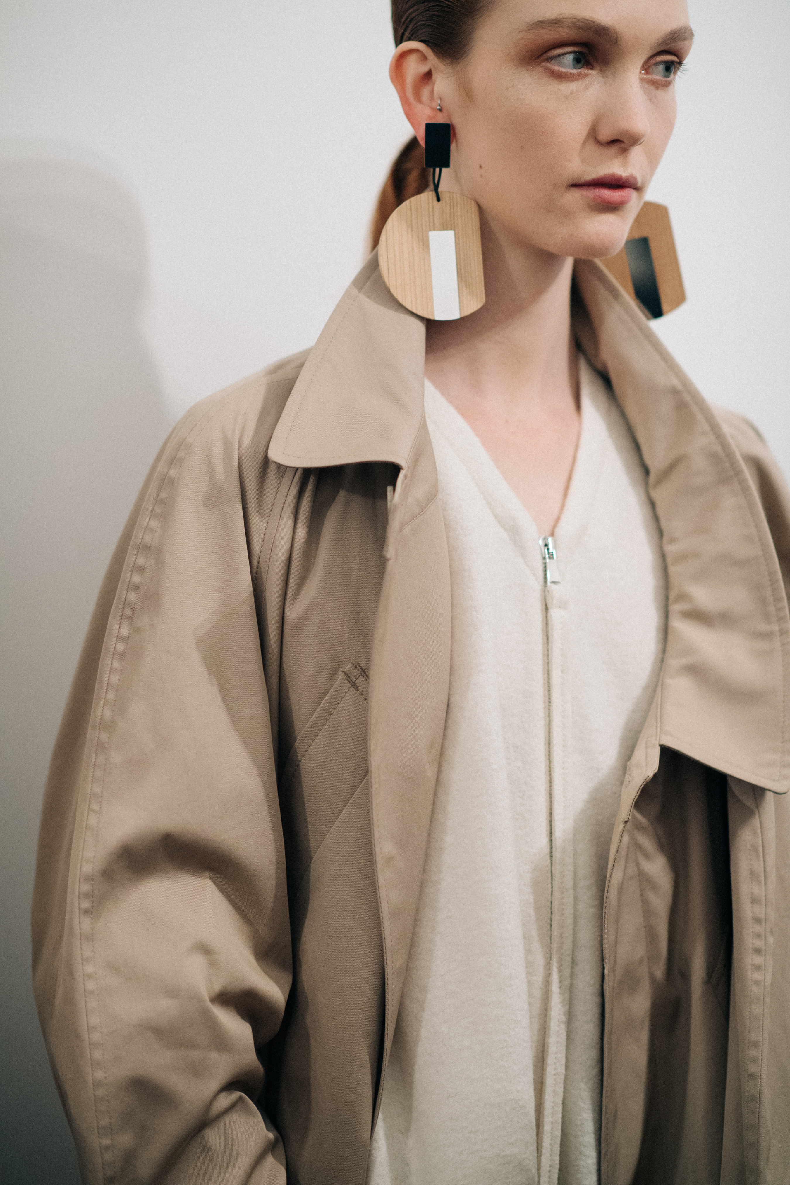 Model wearing a long Nehera coat