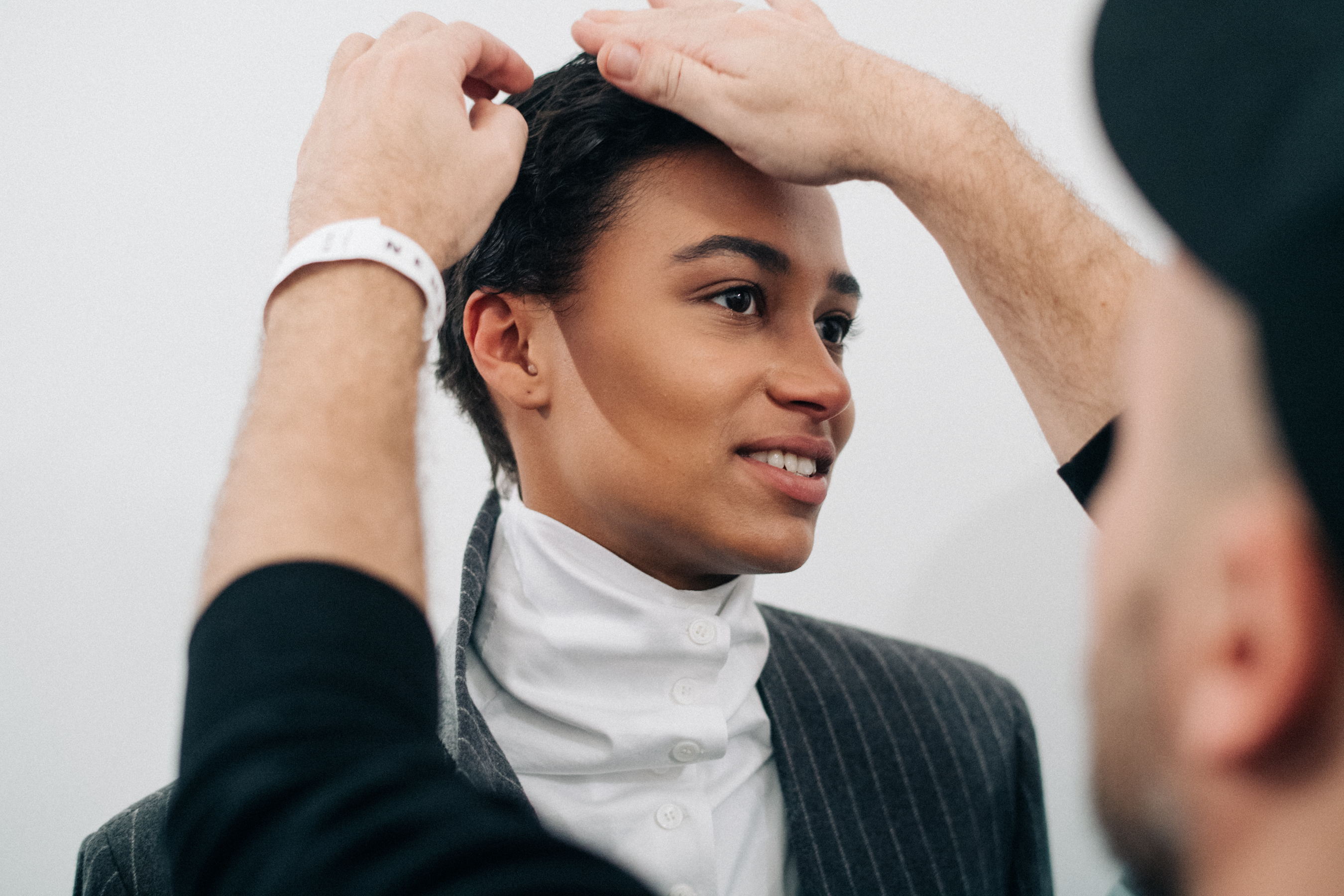 Model getting her hair done