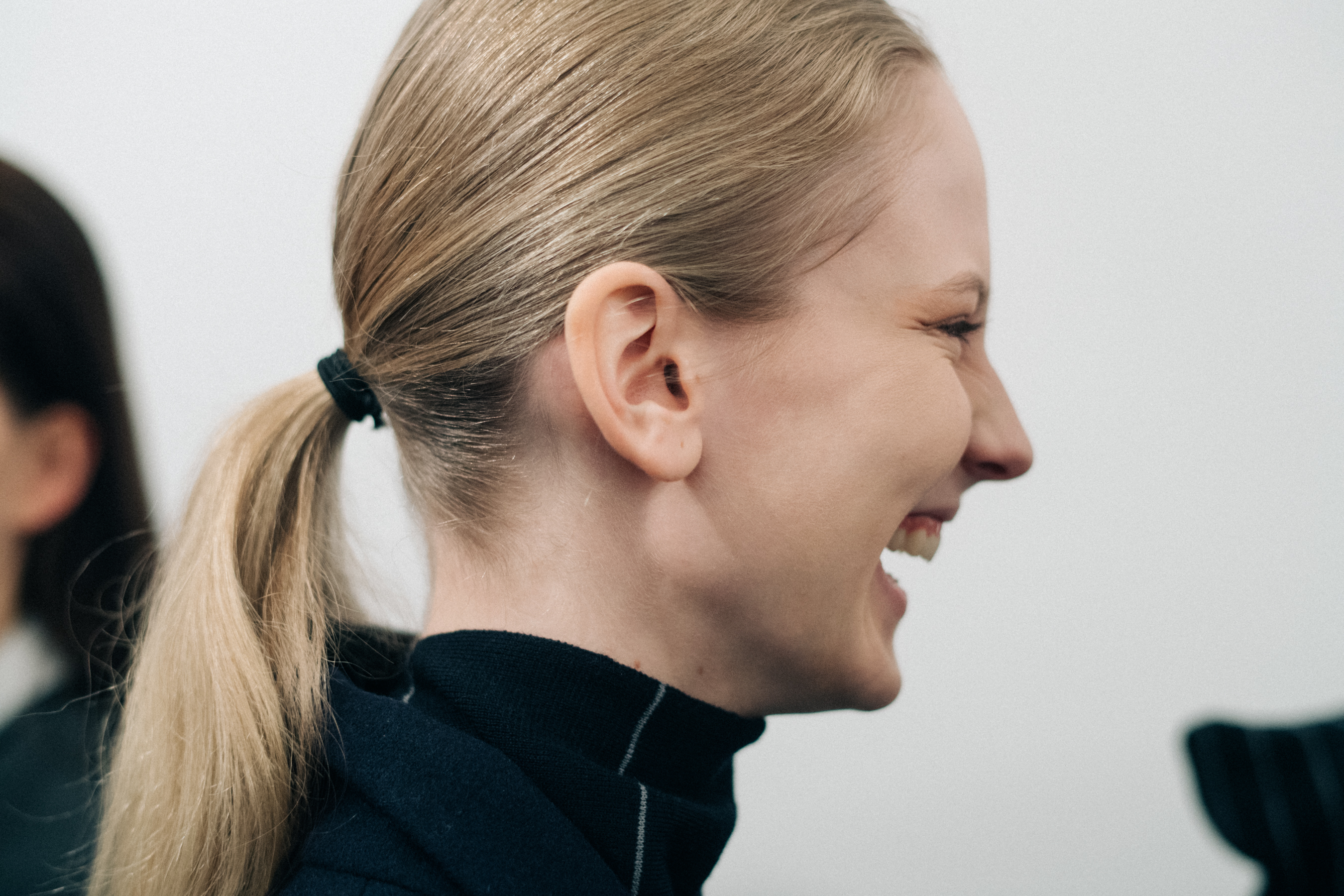 Model laughing at Nehera backstage