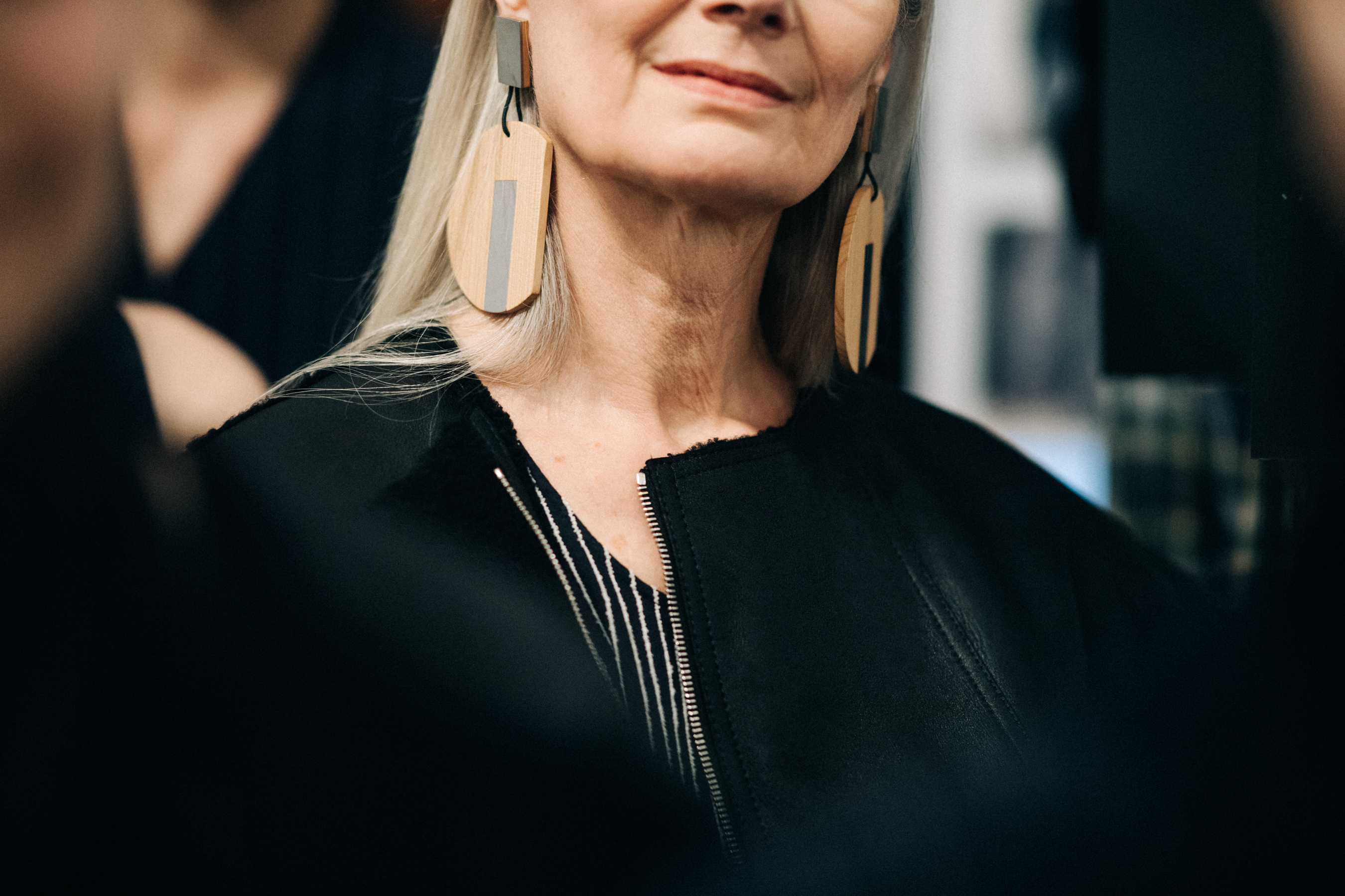 Elder model wearing Nehera earrings