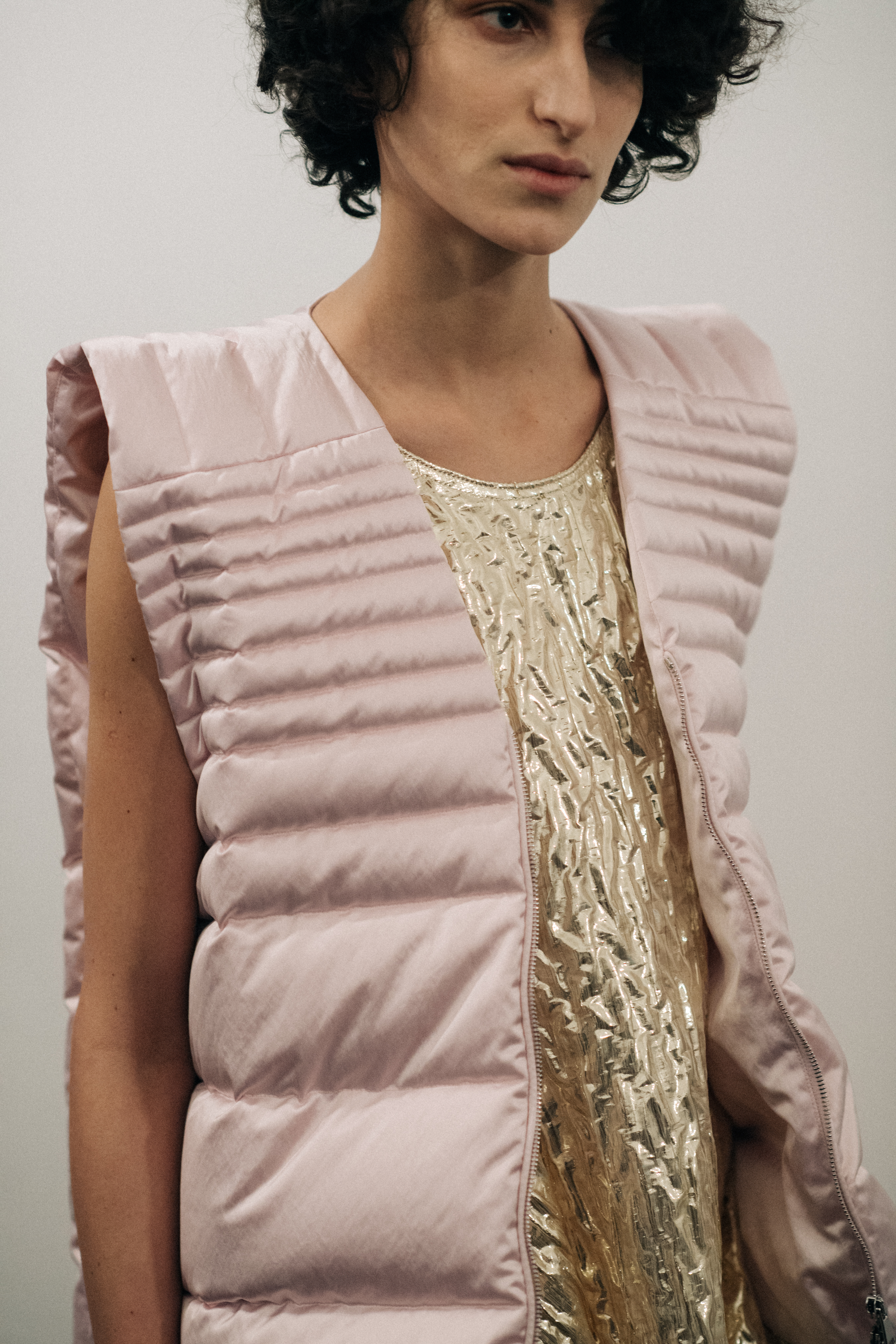 Model wearing a puff pink jacket