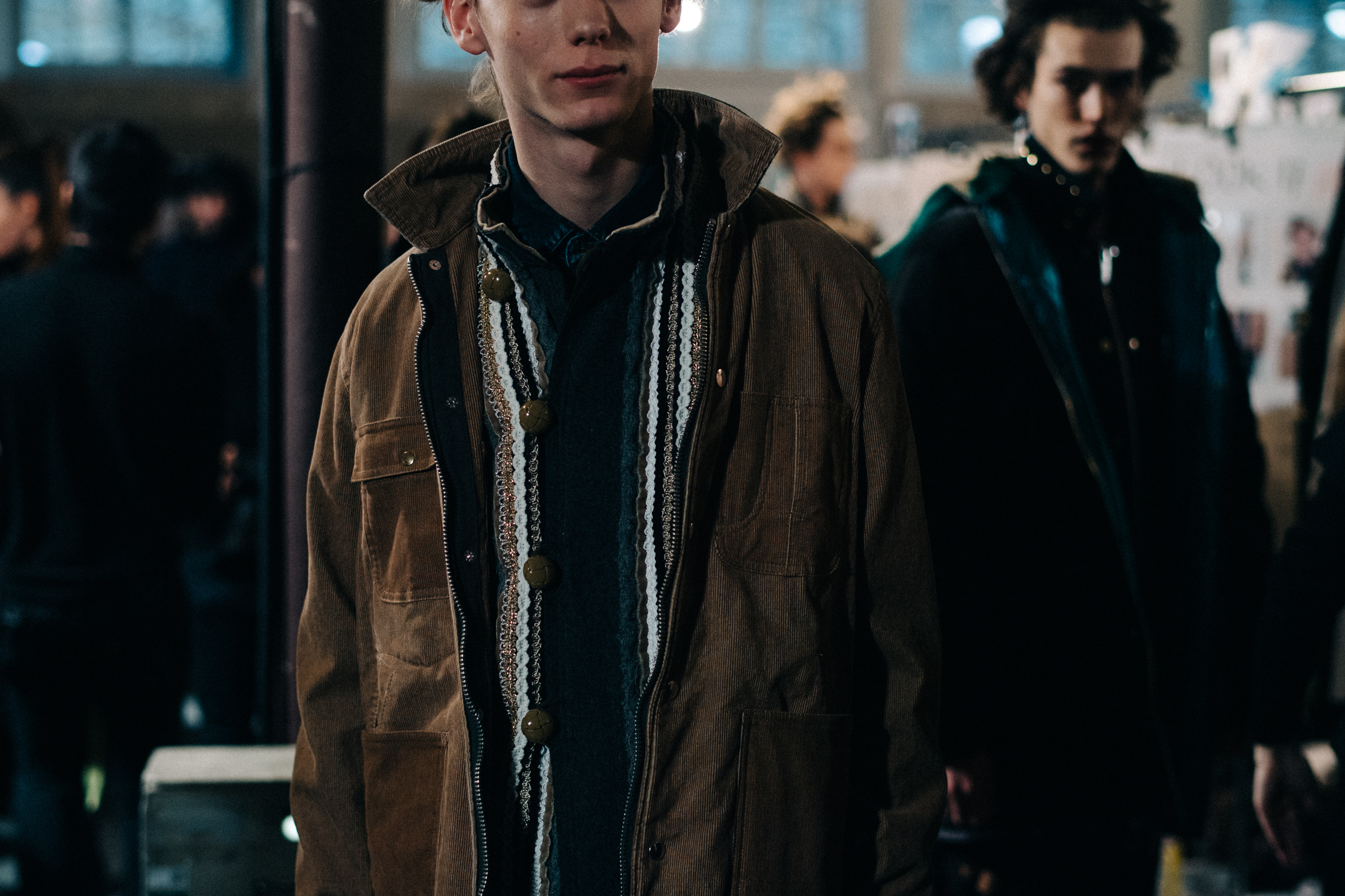 Model wearing a brown coat