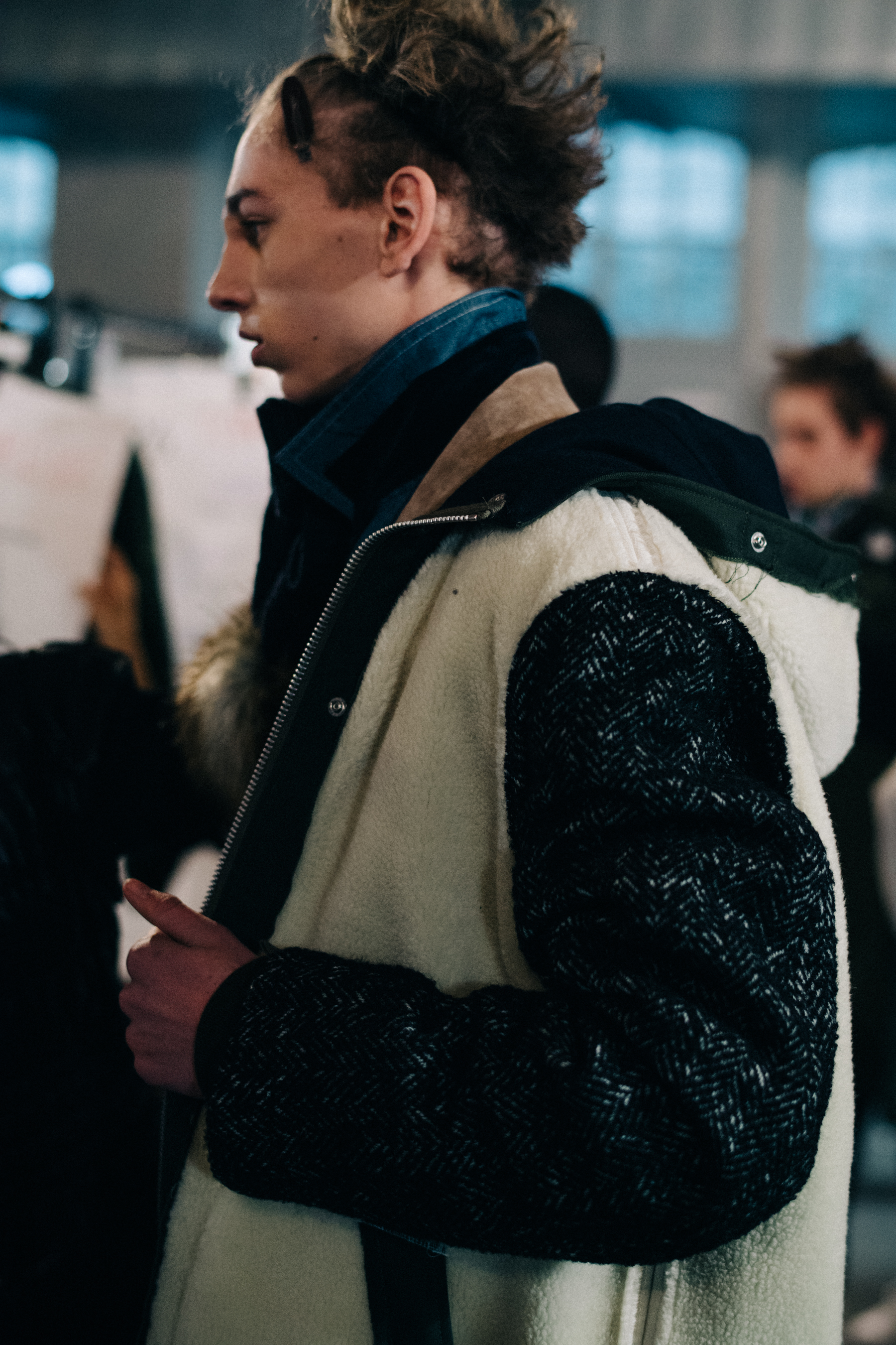 Model wearing a large white coat