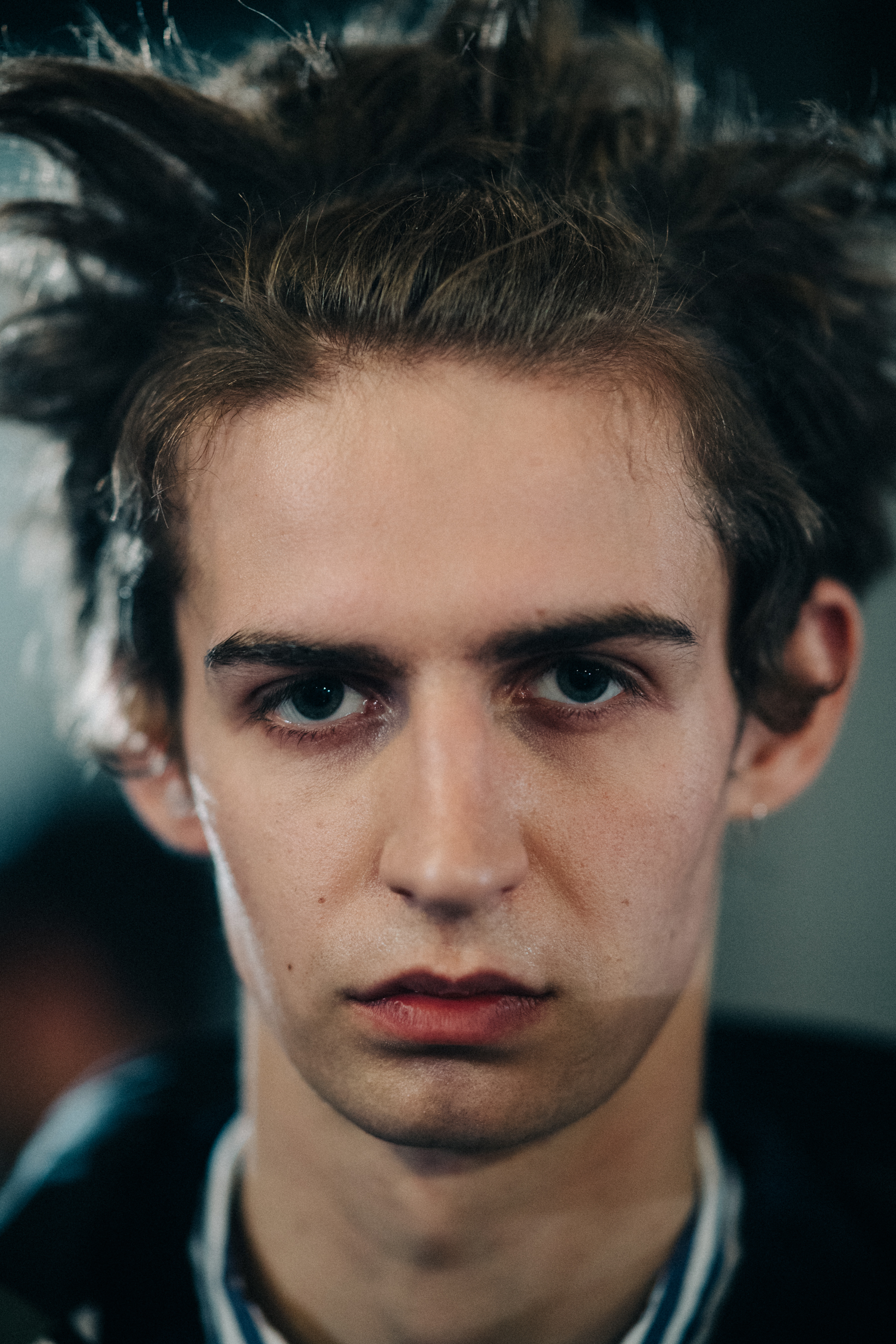 Portrait of a male model at Sacai