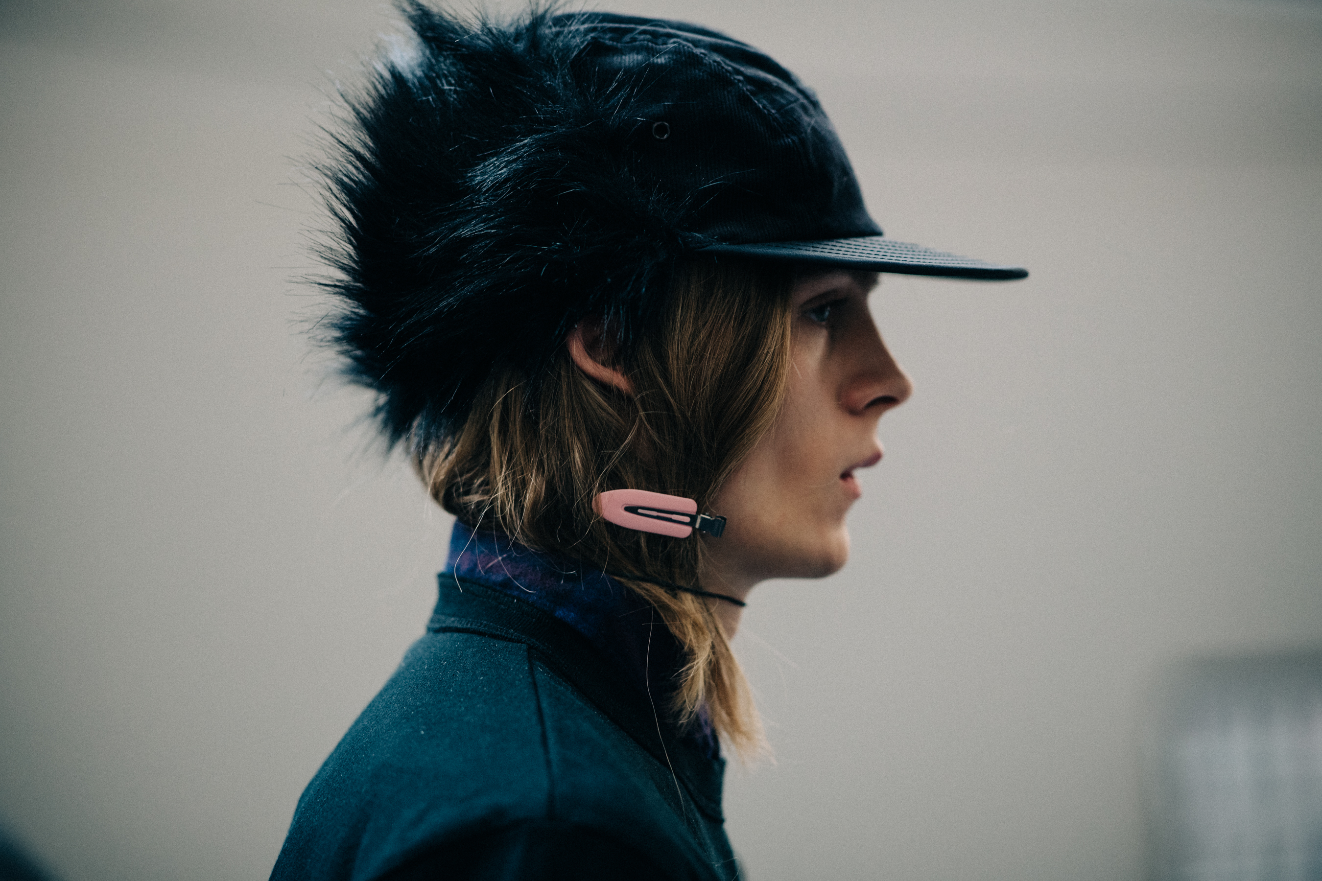 Profile of a male Sacai model