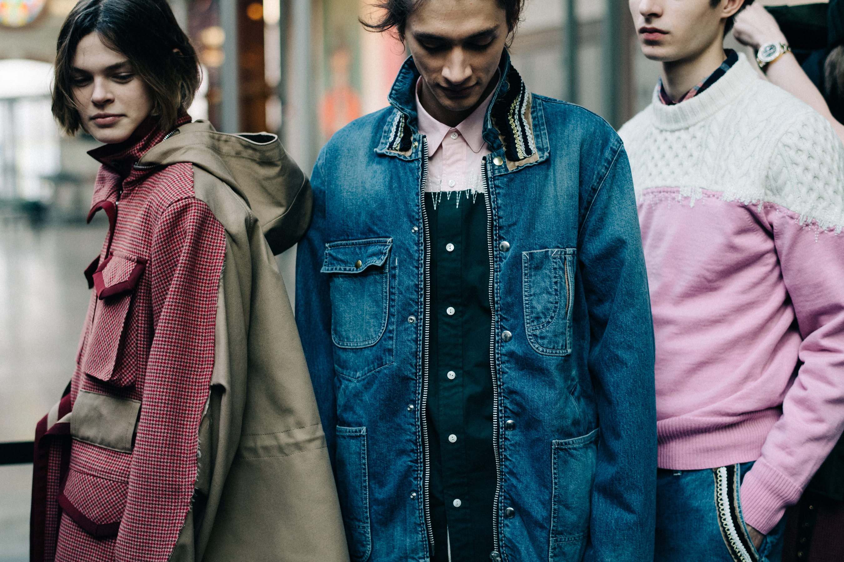 Three models at Sacai backstage