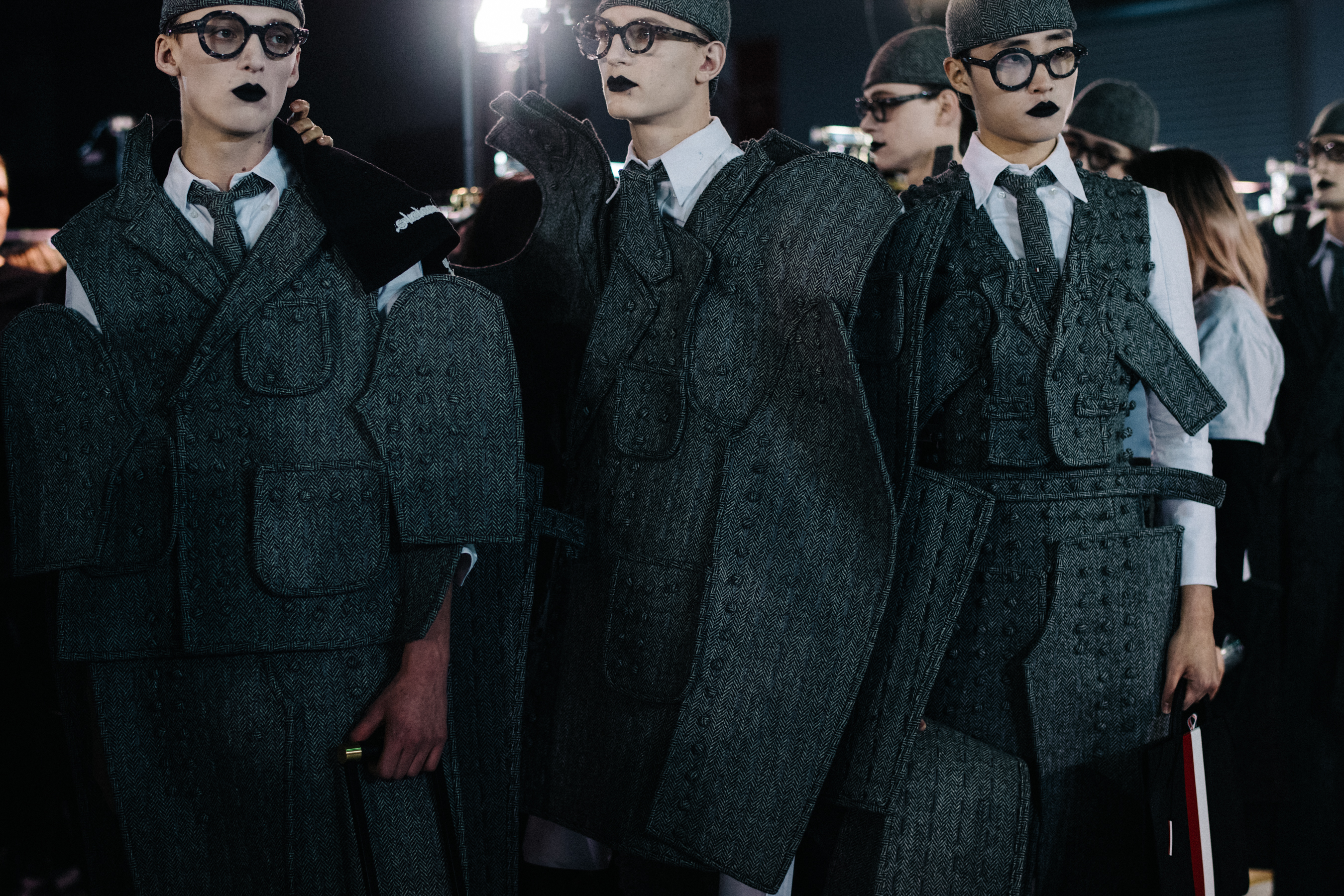 Male models at Thom Browne backstage