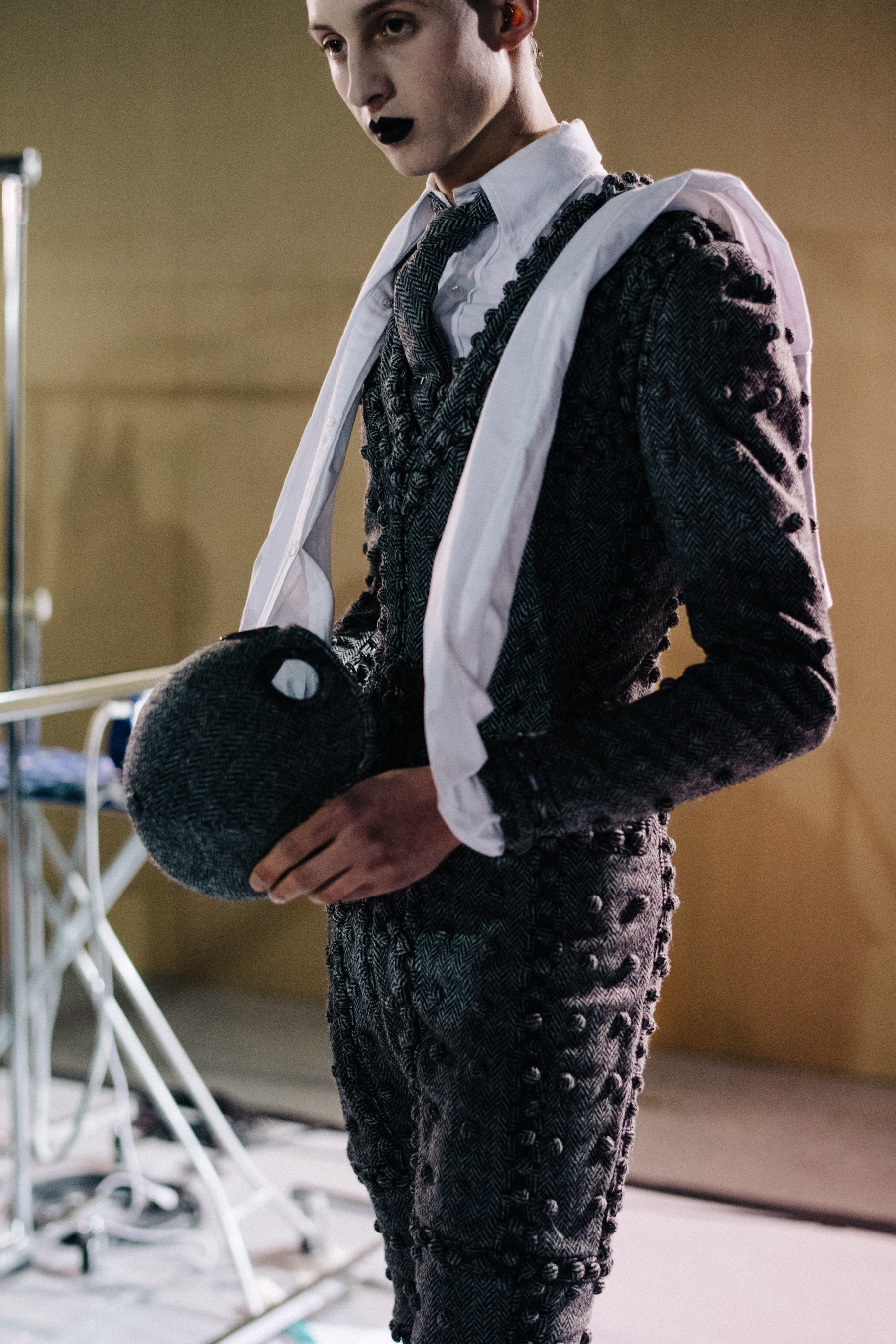 Male model at Thom Browne backstage