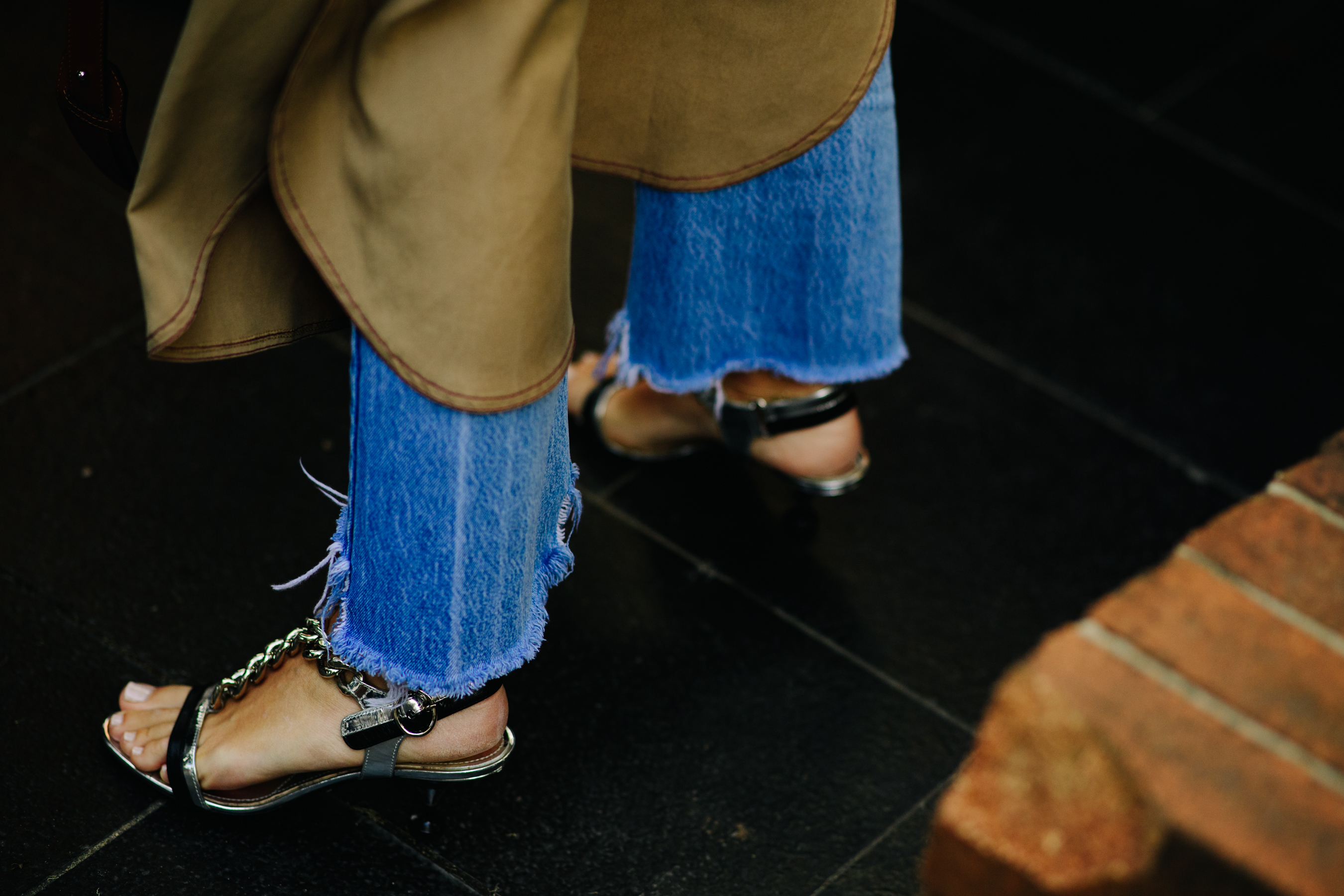 Woman wearing distressed jeans