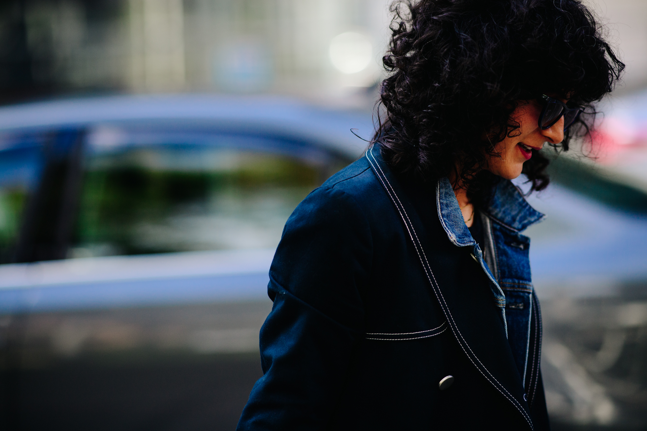 Woman wearing a stitched coat